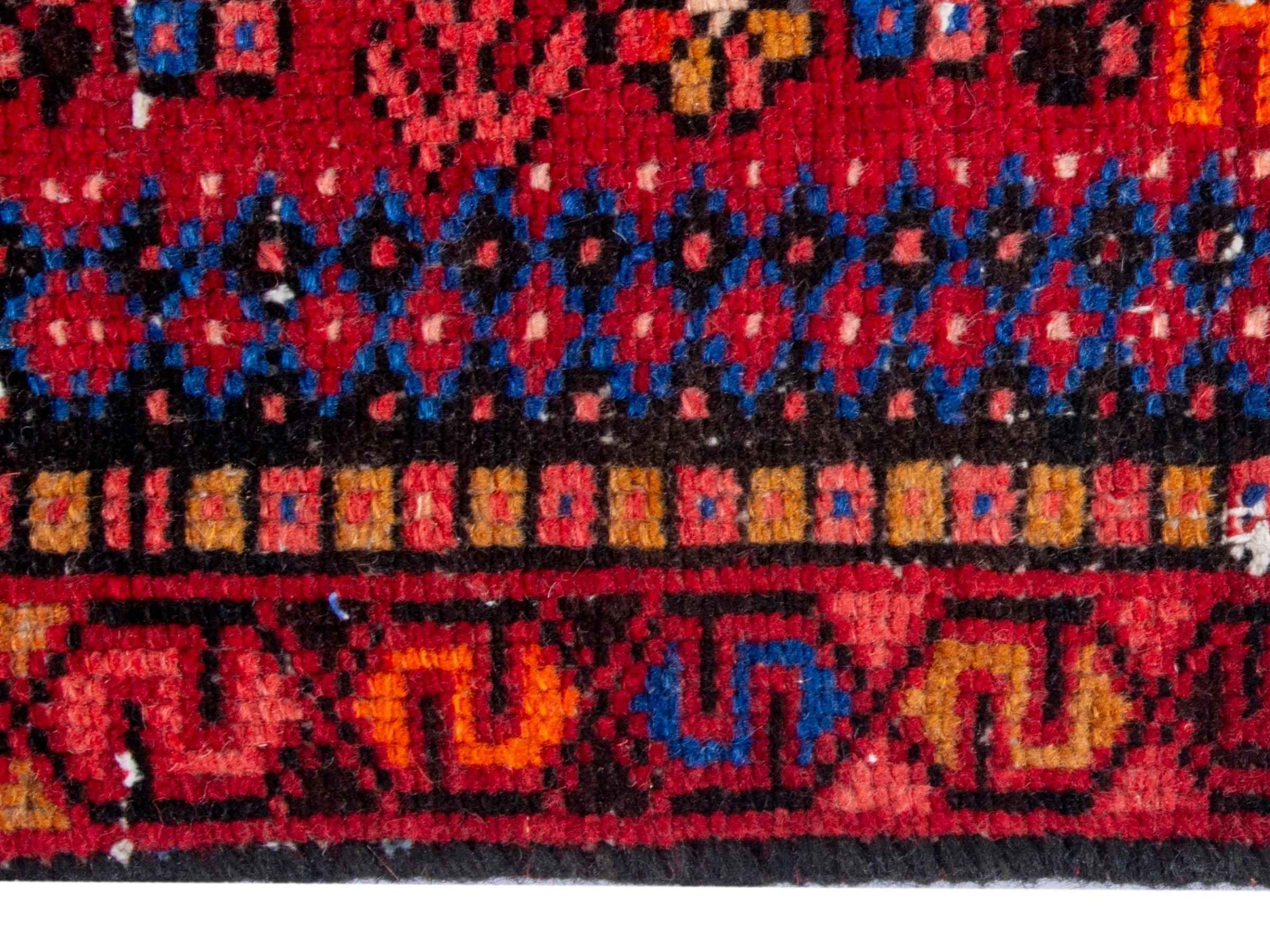 Persian Gharajeh runner rug in deep red and denim, view 10 of 18