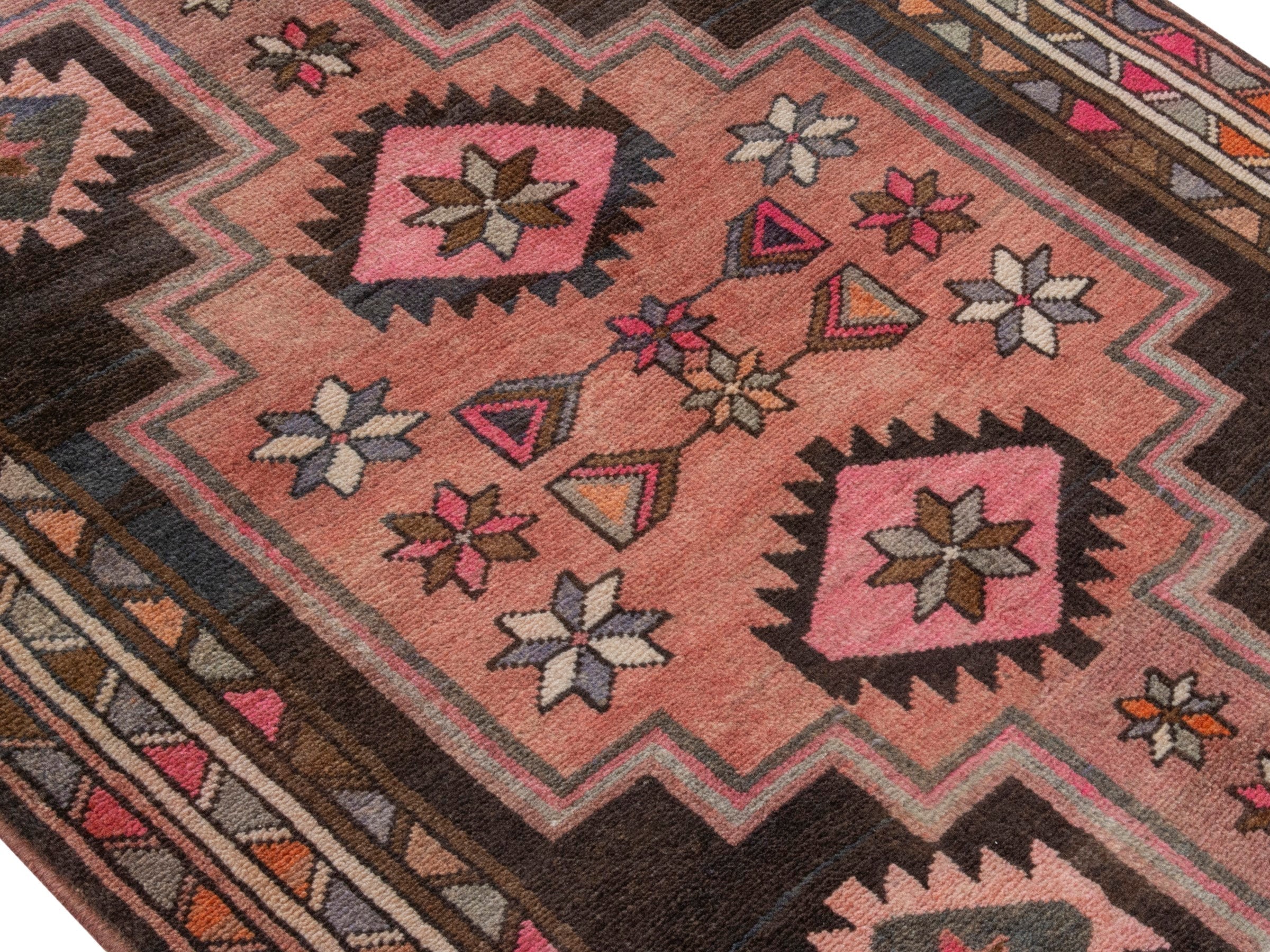 Persian Azerbaijan runner rug in muted pink and dark brown, view 4 of 18