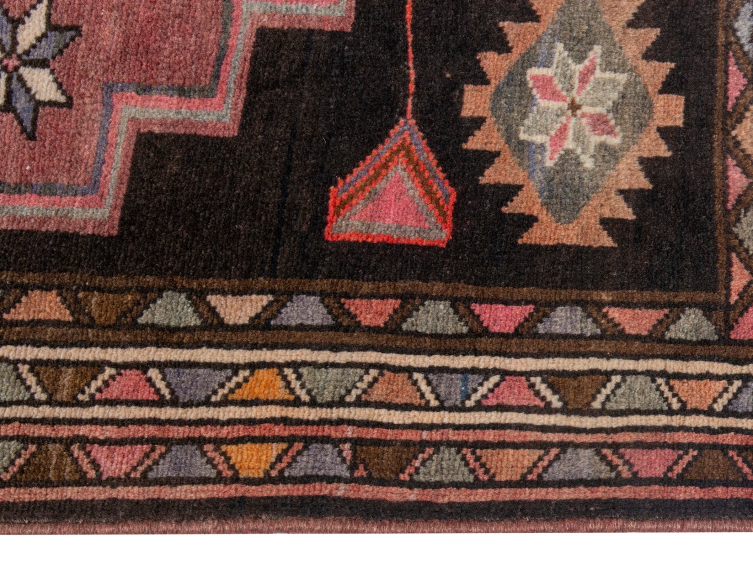 Persian Azerbaijan runner rug in muted pink and dark brown, view 10 of 18