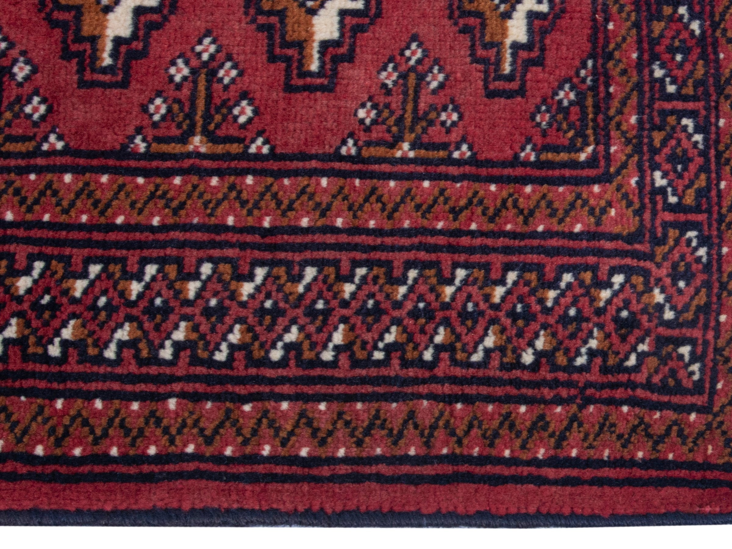 Persian Torkaman runner rug in burgundy and cream, view 10 of 18