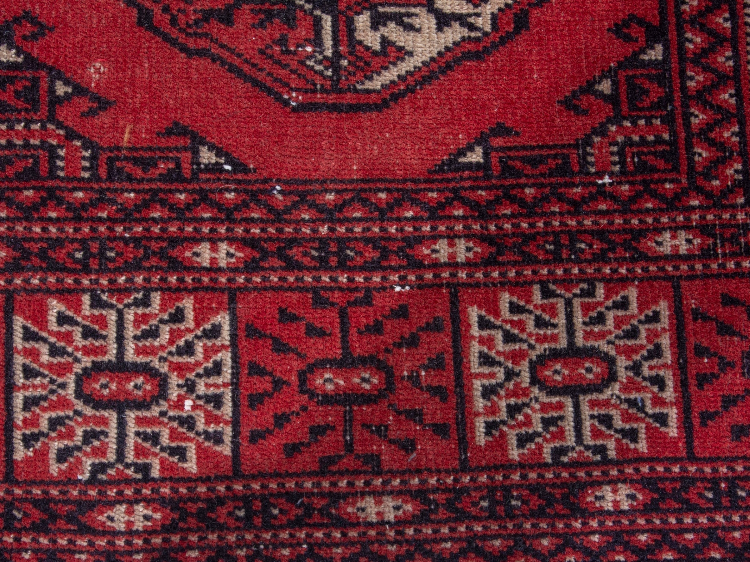 Persian Torkaman runner rug in deep red and cream, view 11 of 18