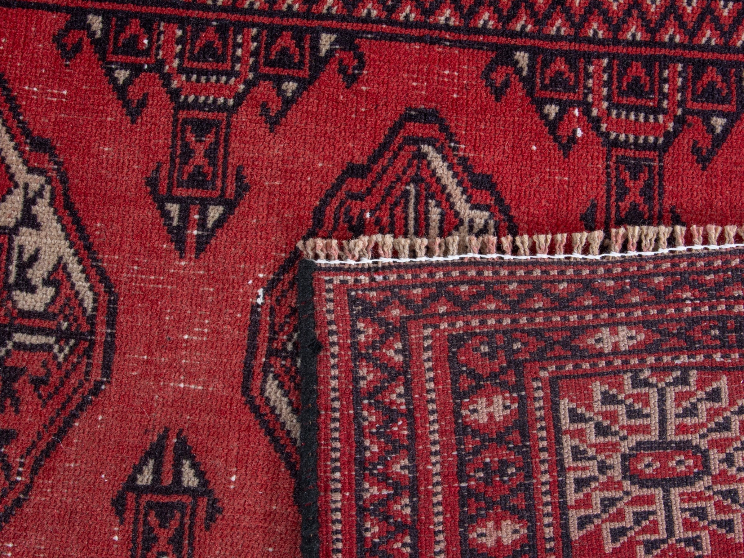 Persian Torkaman runner rug in deep red and cream, view 18 of 18