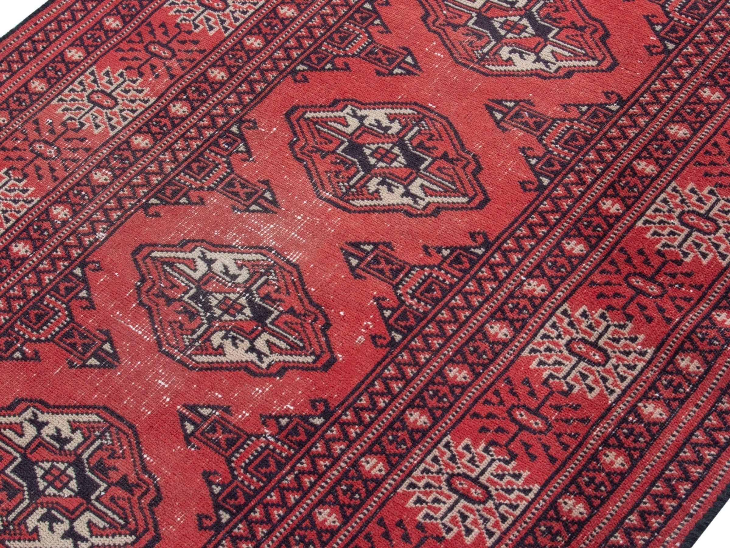 Persian Torkaman runner rug in deep red and cream, view 4 of 18
