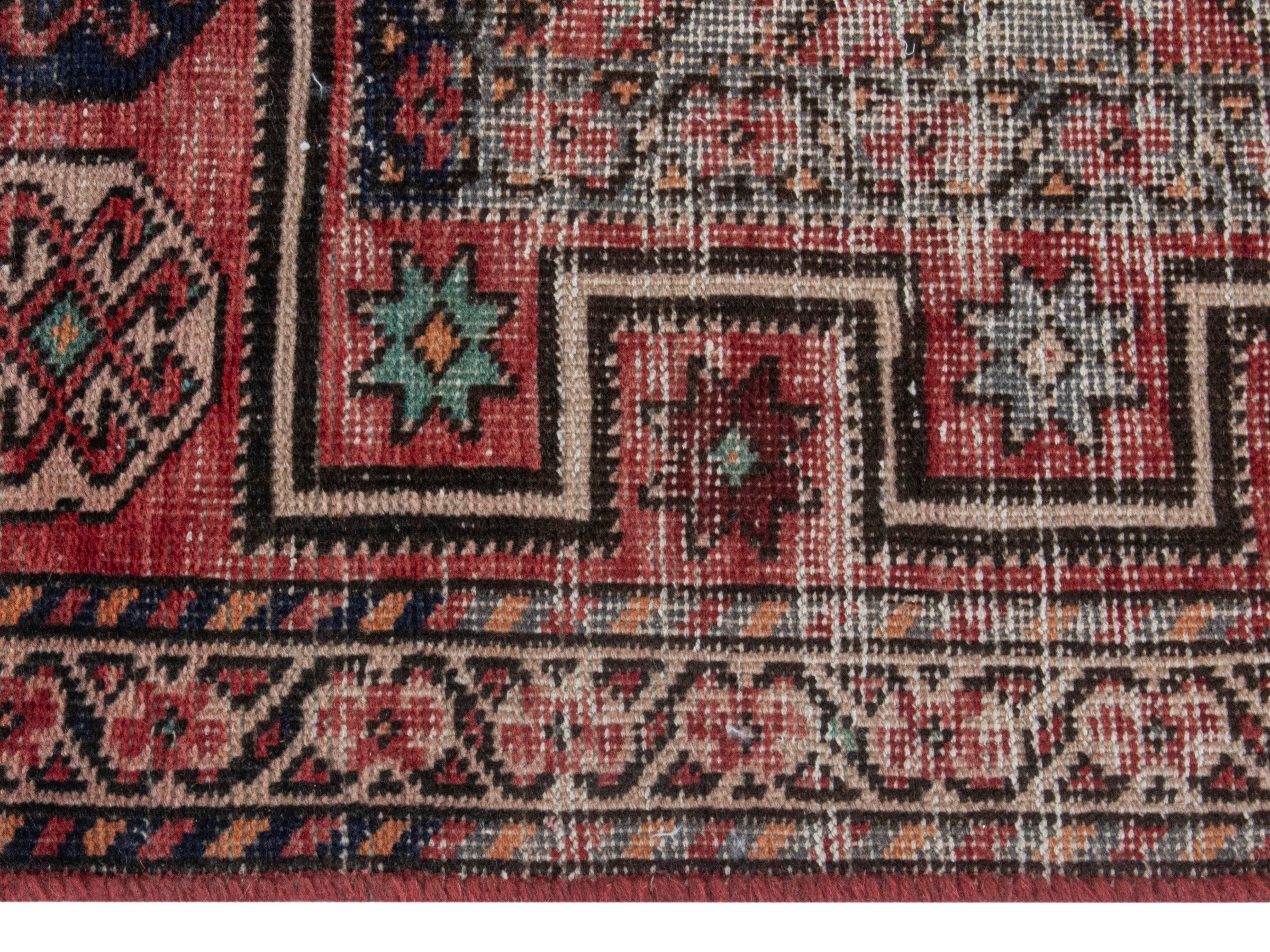 Persian Ghoochan runner rug in faded red and cream, view 10 of 20