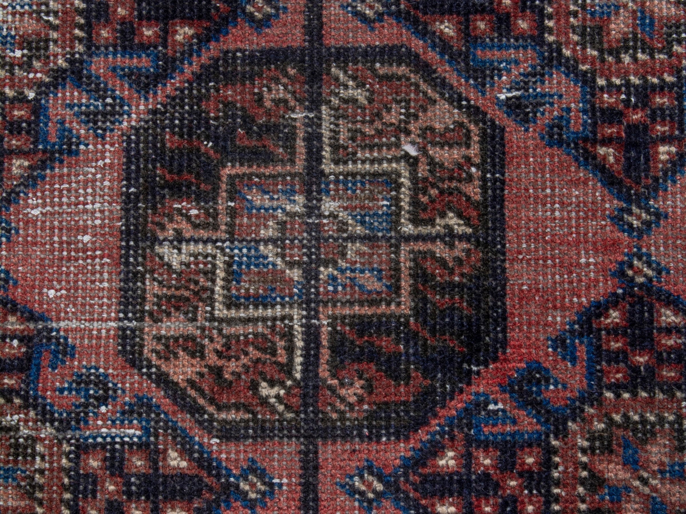 Persian Ferdos runner rug in dusty rose and dark blue, view 12 of 18