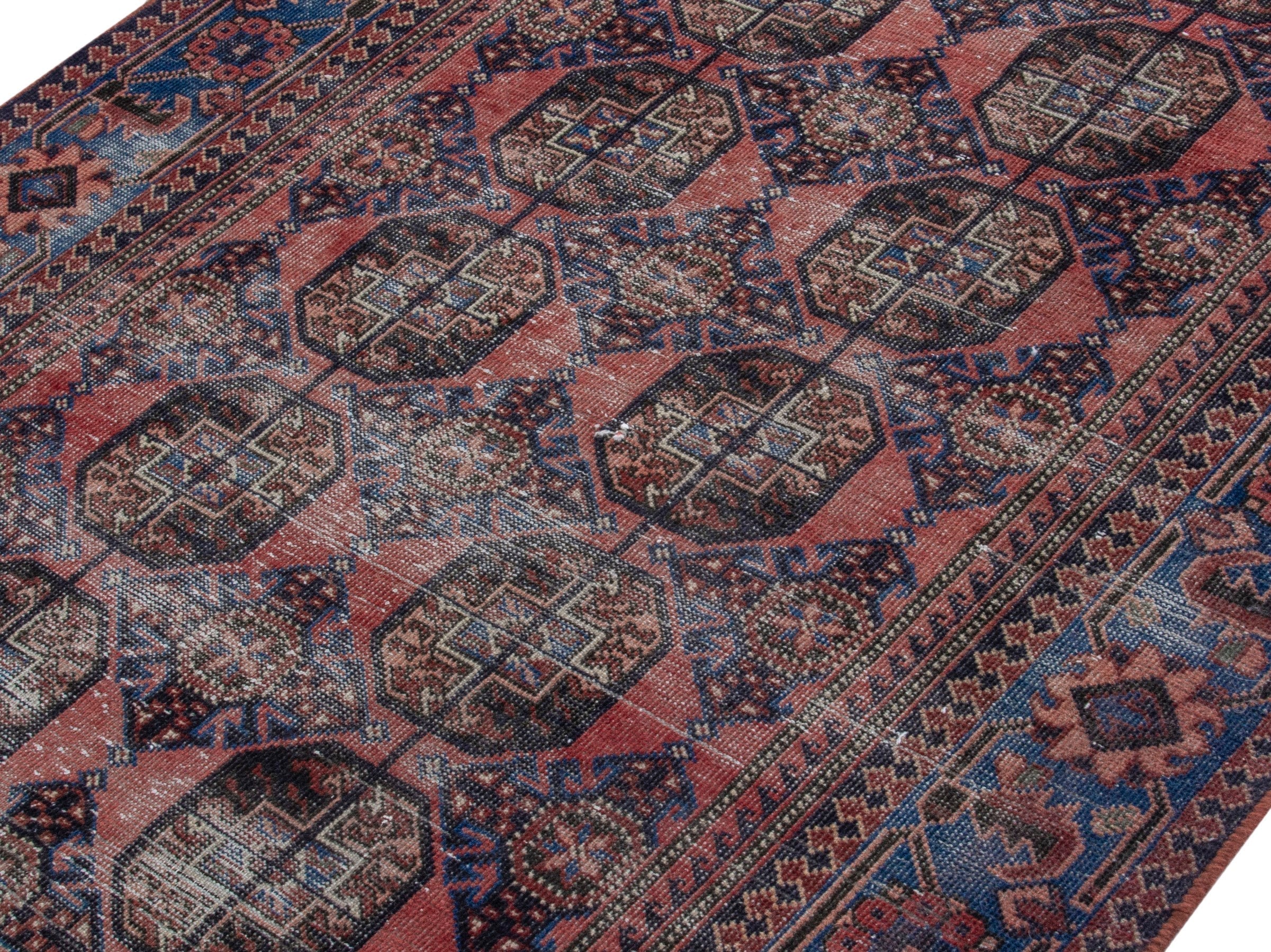 Persian Ferdos runner rug in dusty rose and dark blue, view 4 of 18
