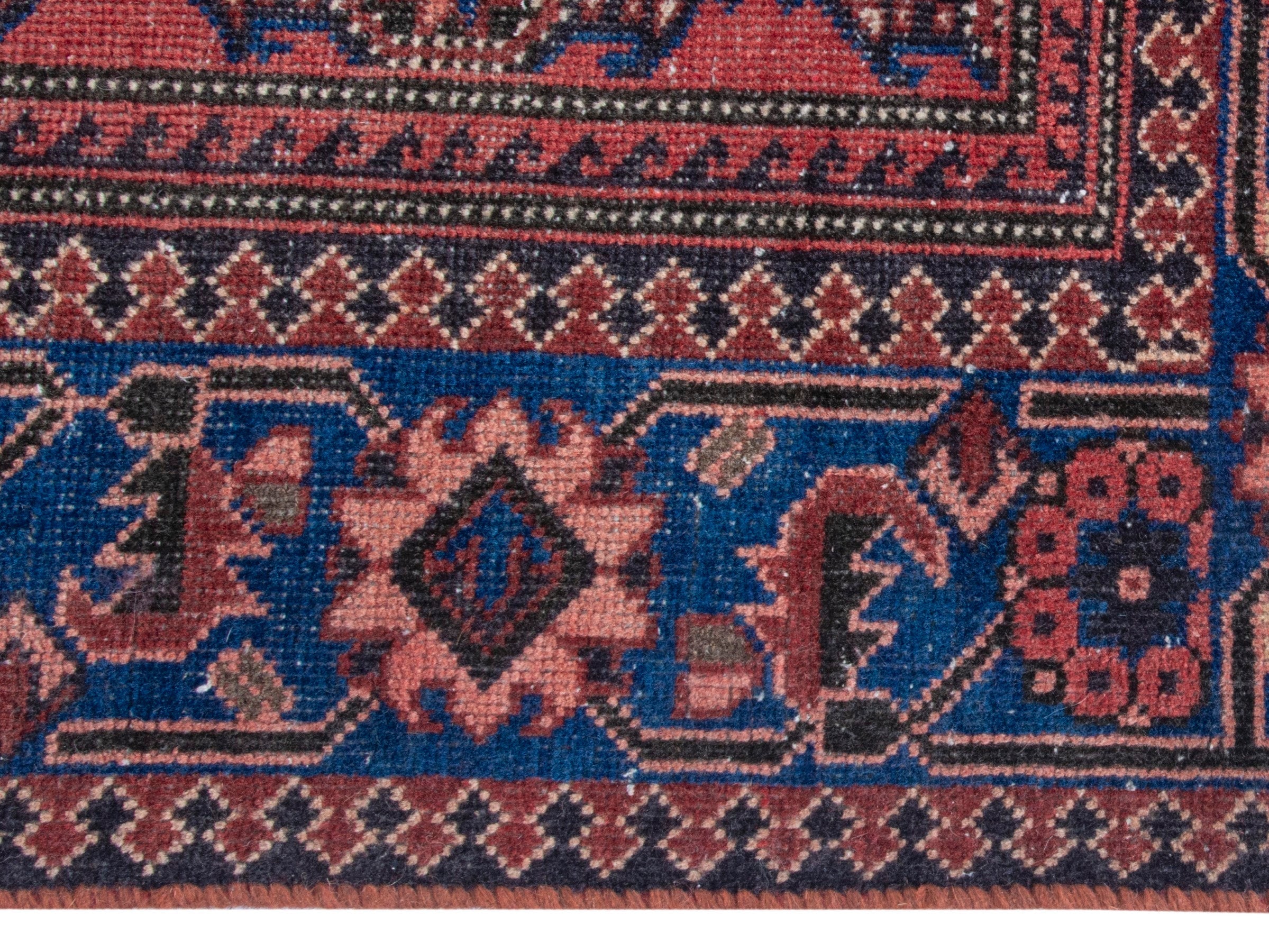 Persian Ferdos runner rug in dusty rose and dark blue, view 10 of 18