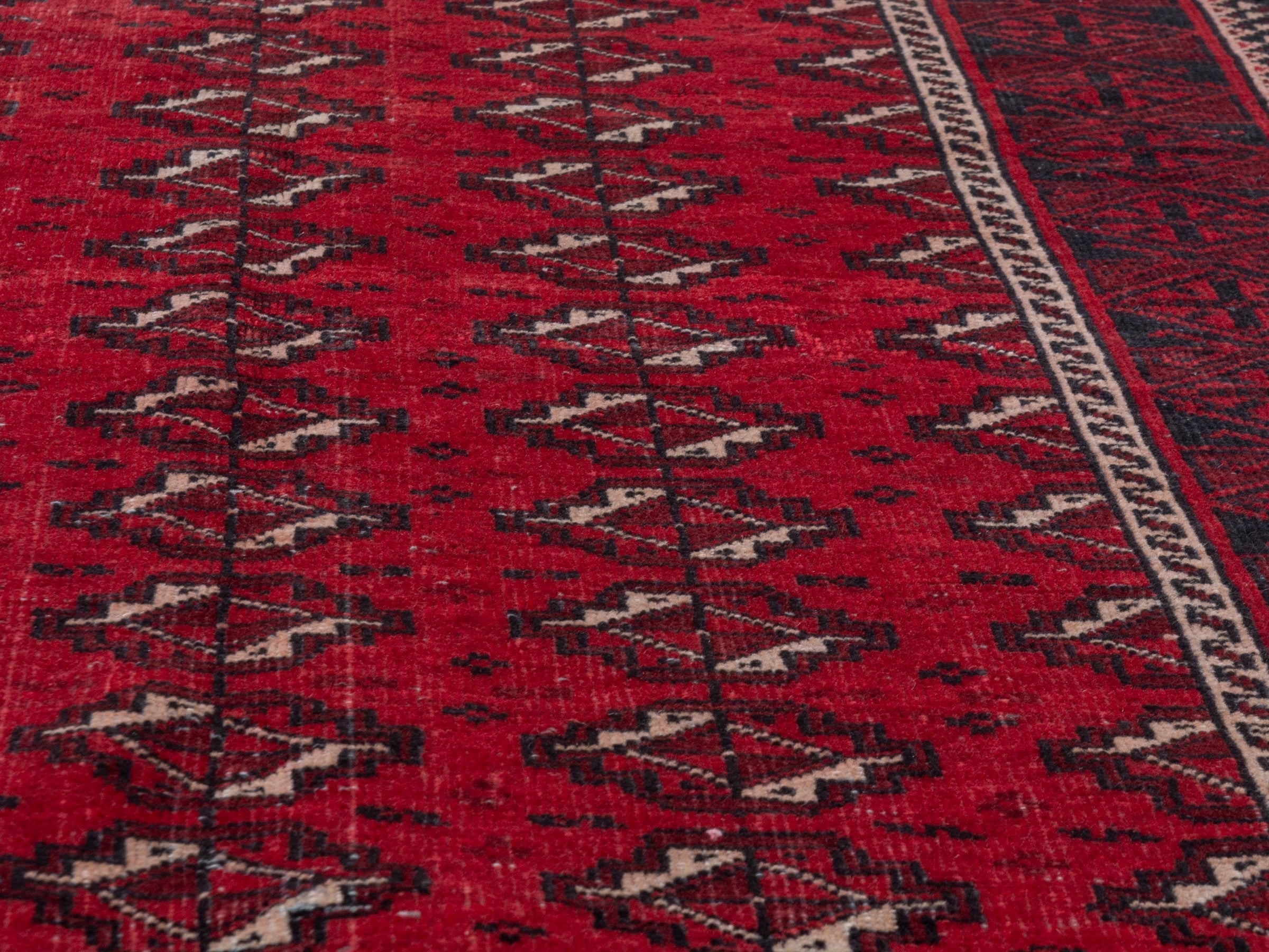Persian Baluch runner rug in deep red and burgundy, view 8 of 18