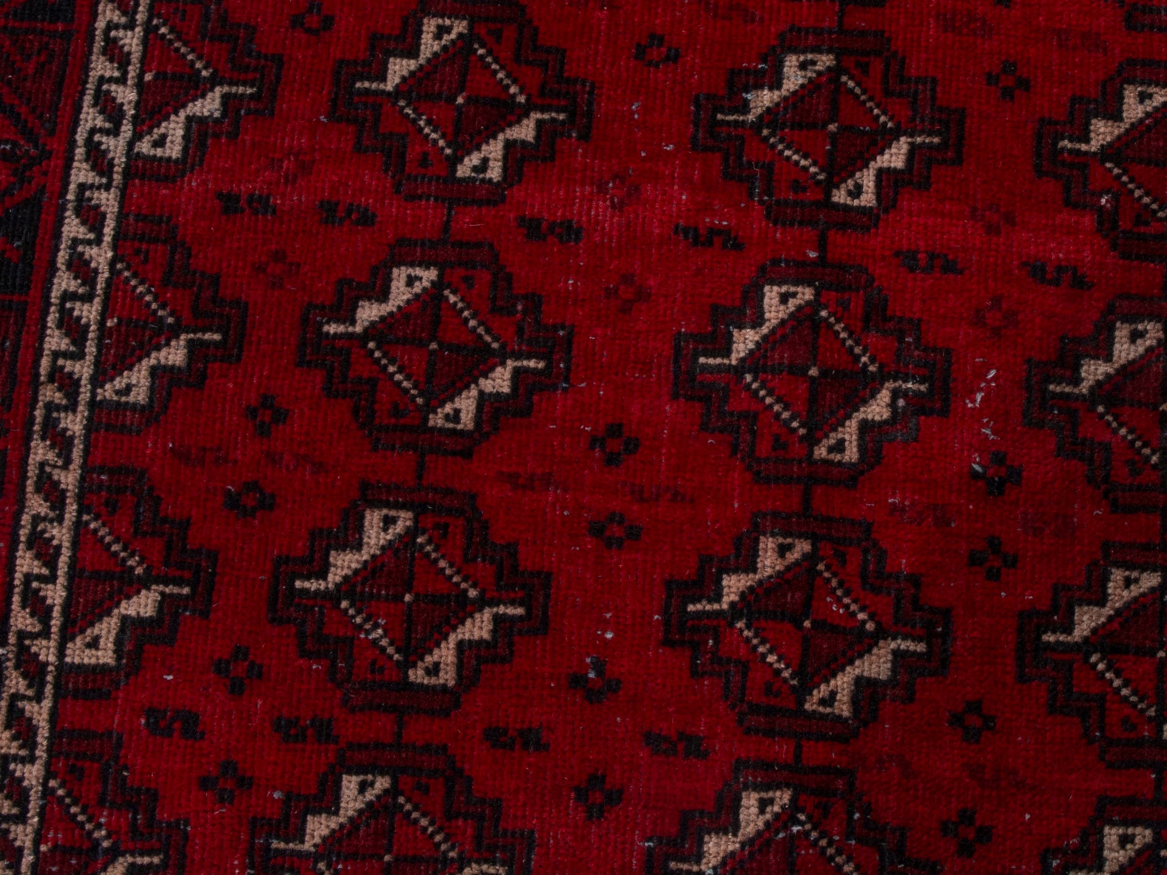 Persian Baluch runner rug in deep red and burgundy, view 14 of 18
