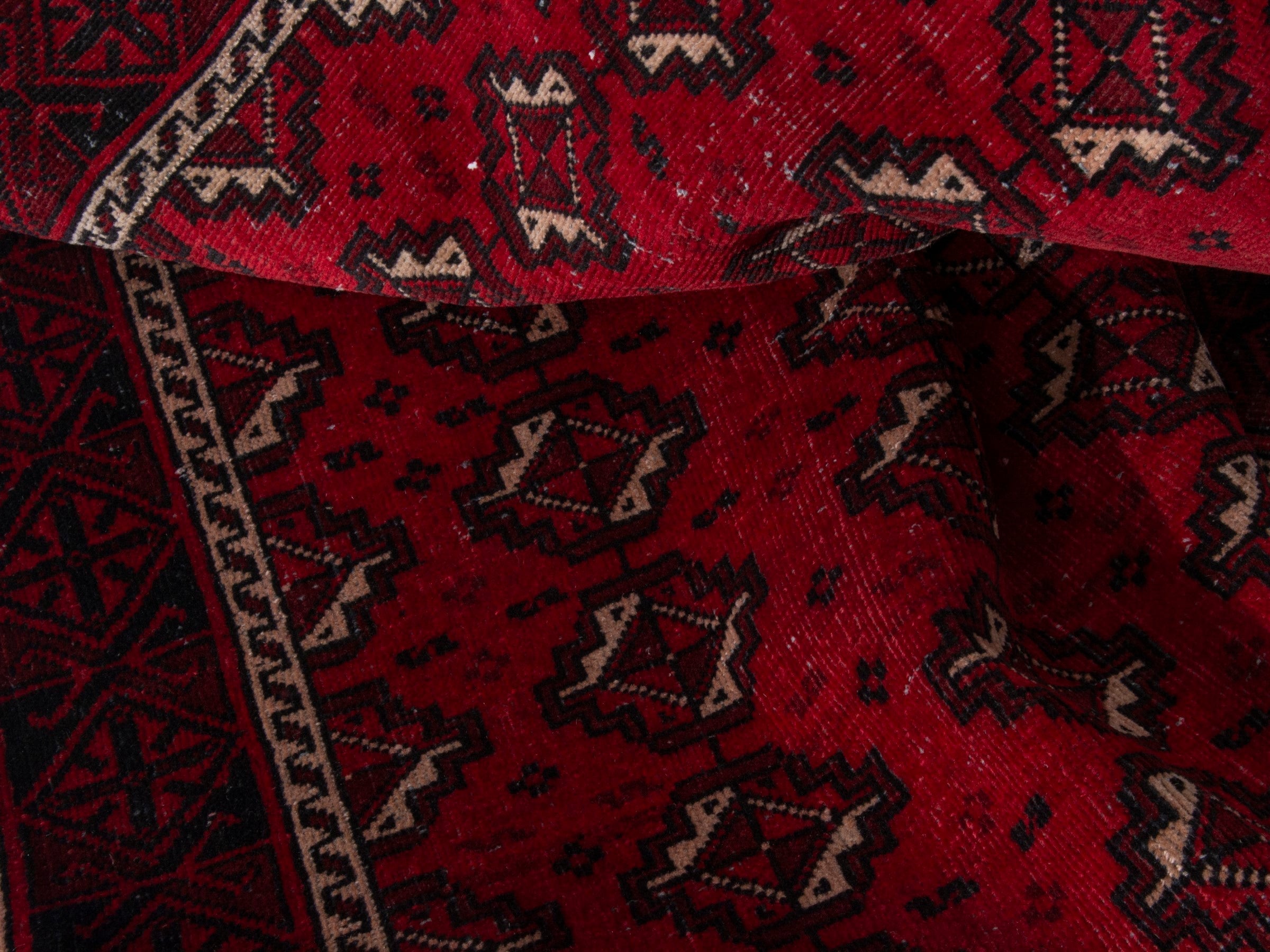 Persian Baluch runner rug in deep red and burgundy, view 17 of 18