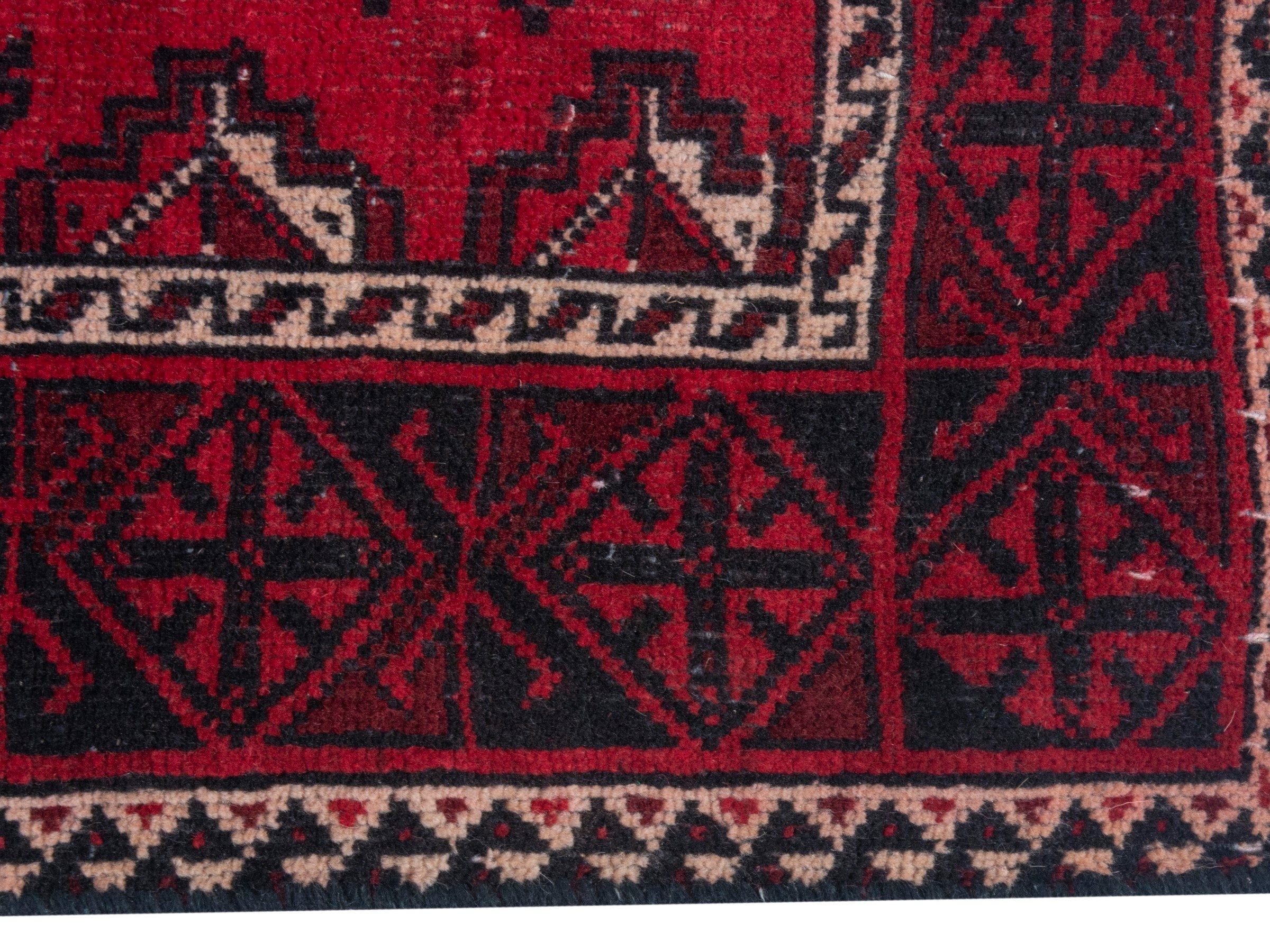 Persian Baluch runner rug in deep red and burgundy, view 10 of 18