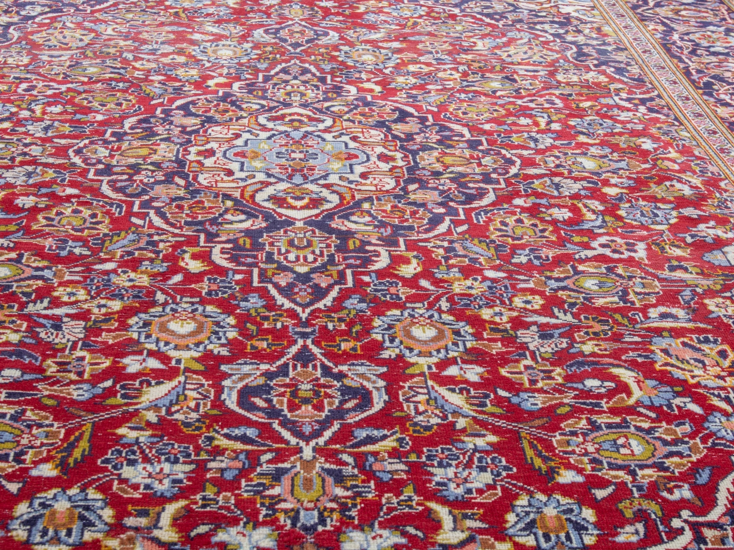 Persian Kashan area rug in deep red and dark blue, view 11 of 22