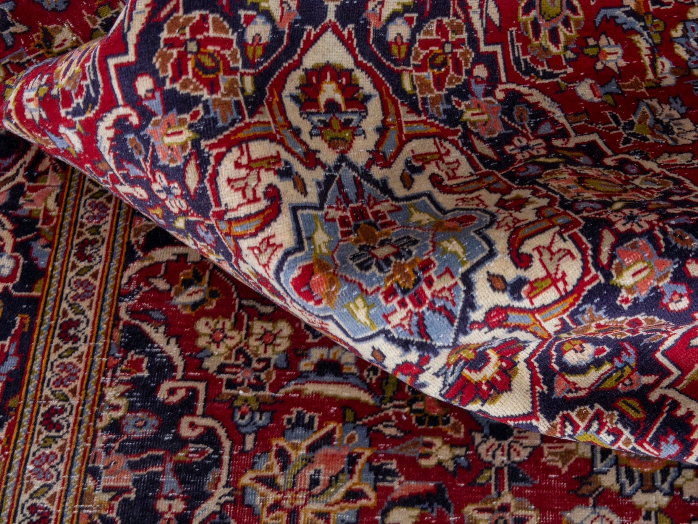 Persian Kashan area rug in deep red and dark blue, view 21 of 22