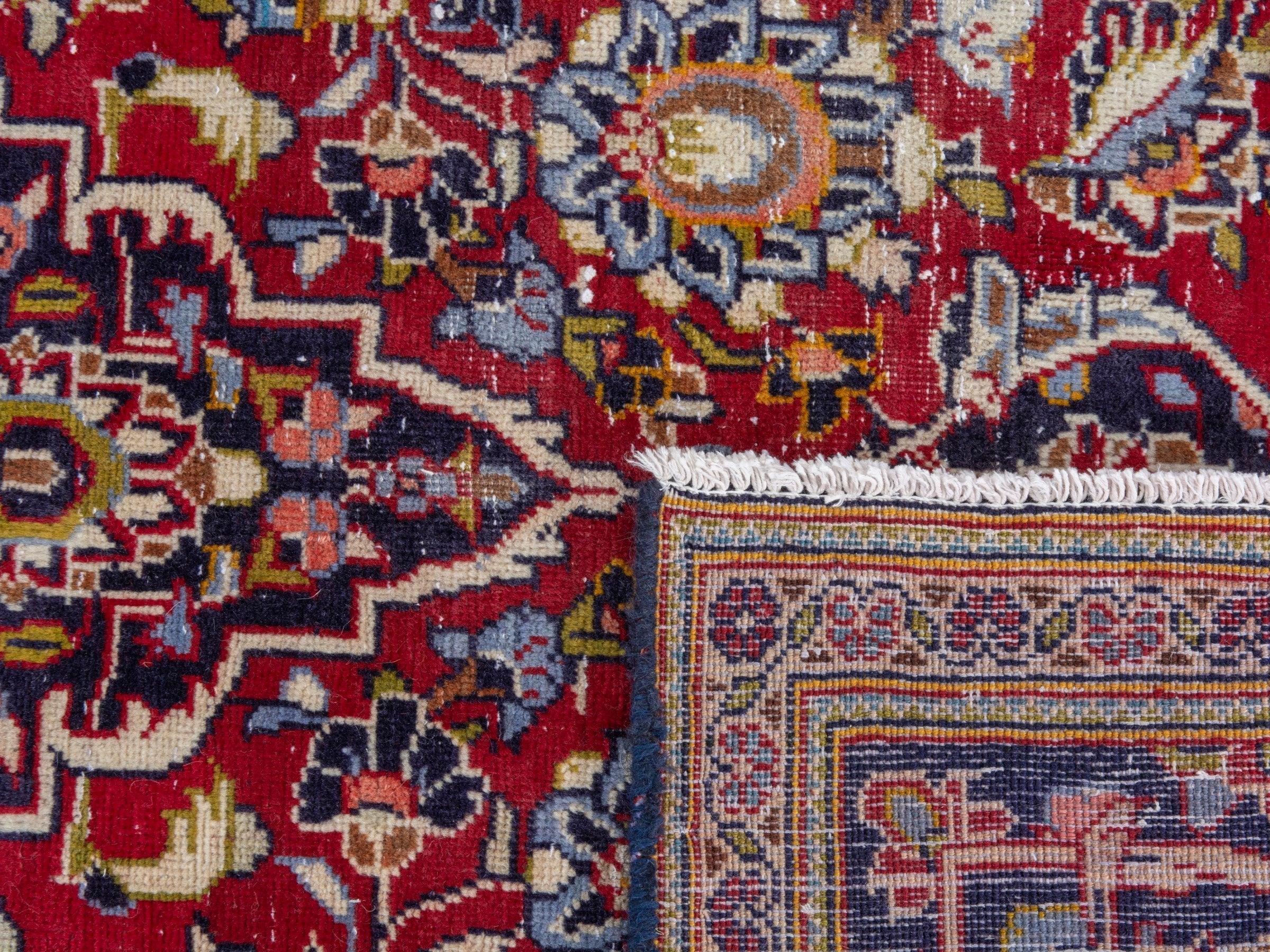 Persian Kashan area rug in deep red and dark blue, view 22 of 22