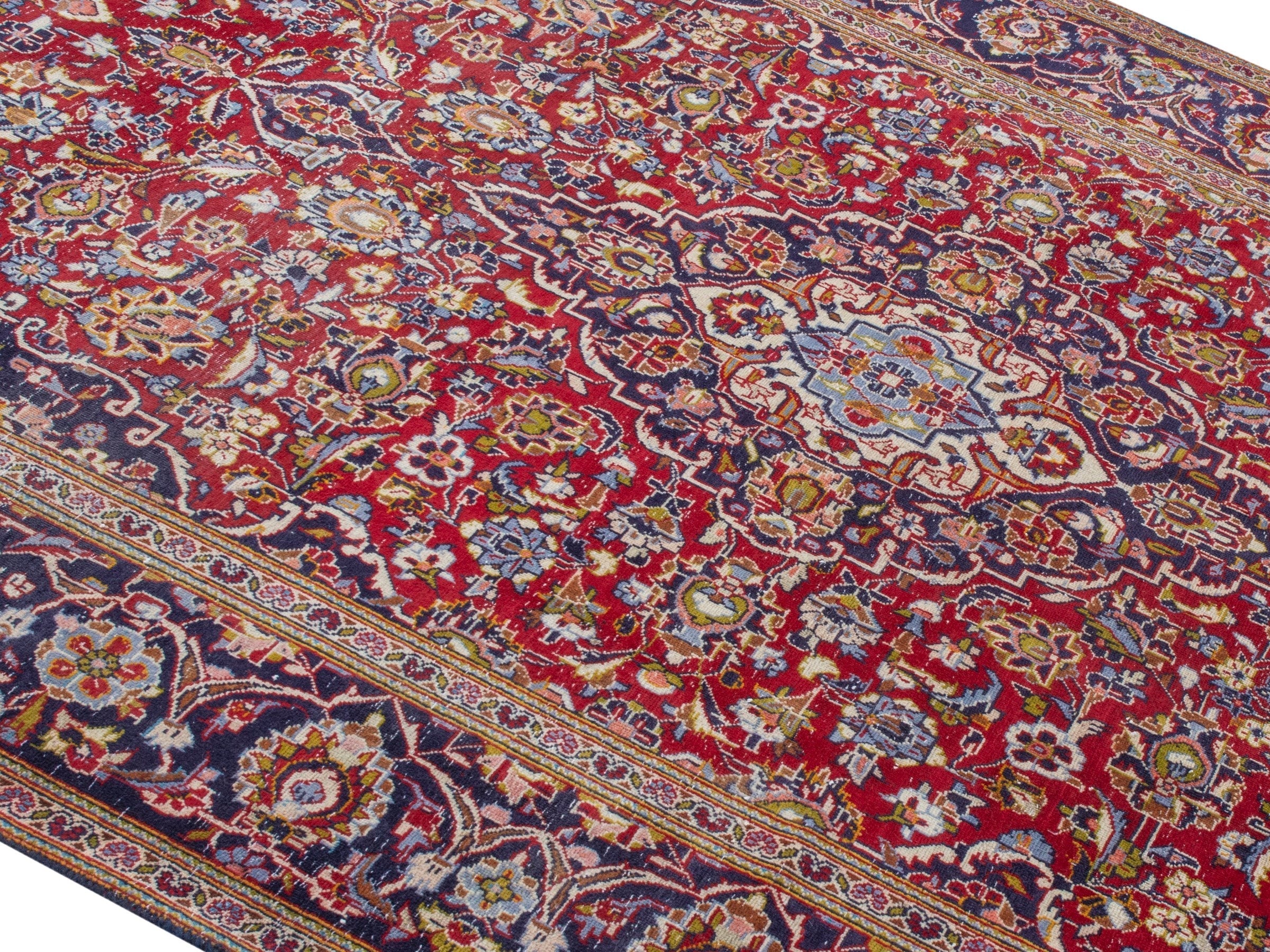 Persian Kashan area rug in deep red and dark blue, view 4 of 22