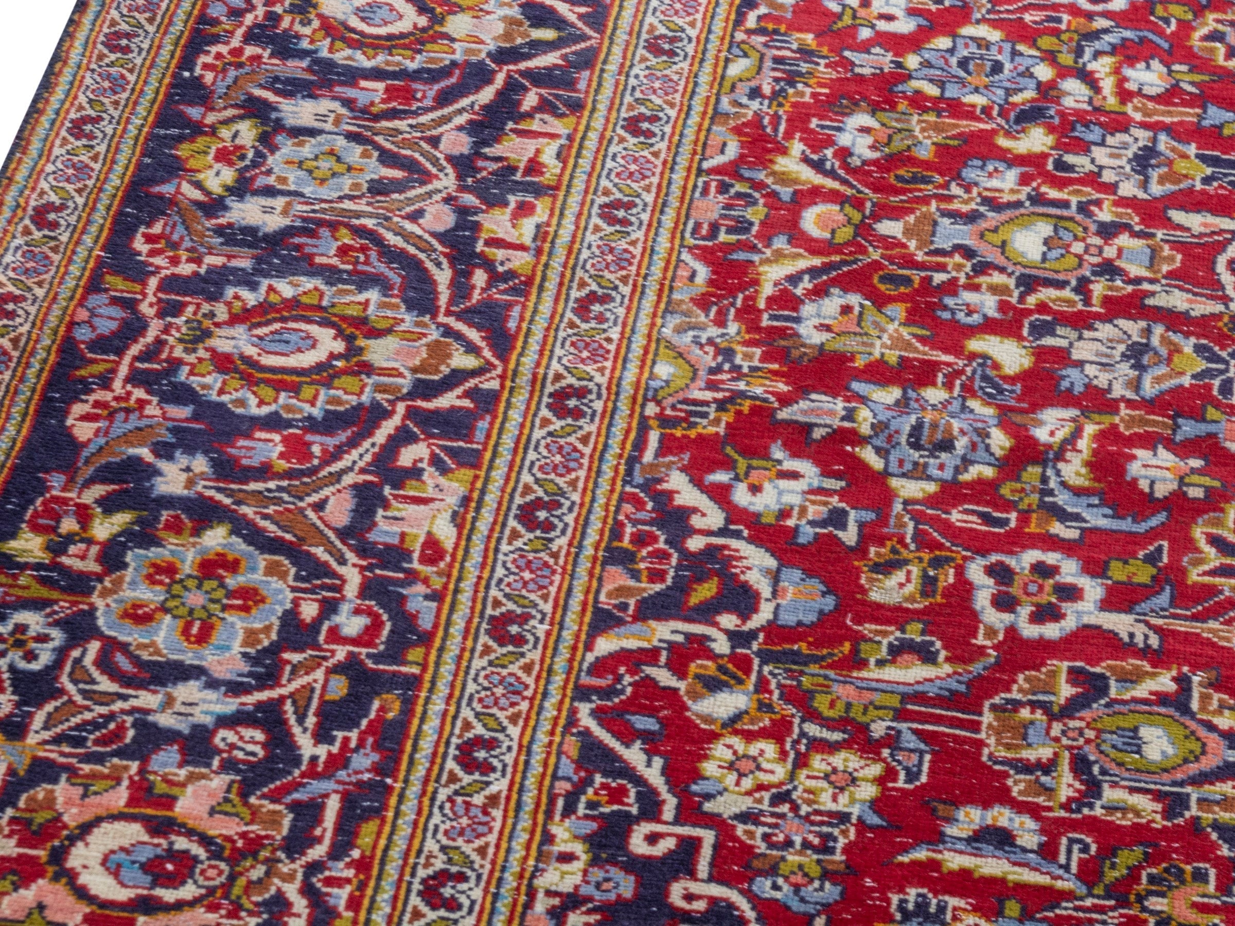 Persian Kashan area rug in deep red and dark blue, view 9 of 22