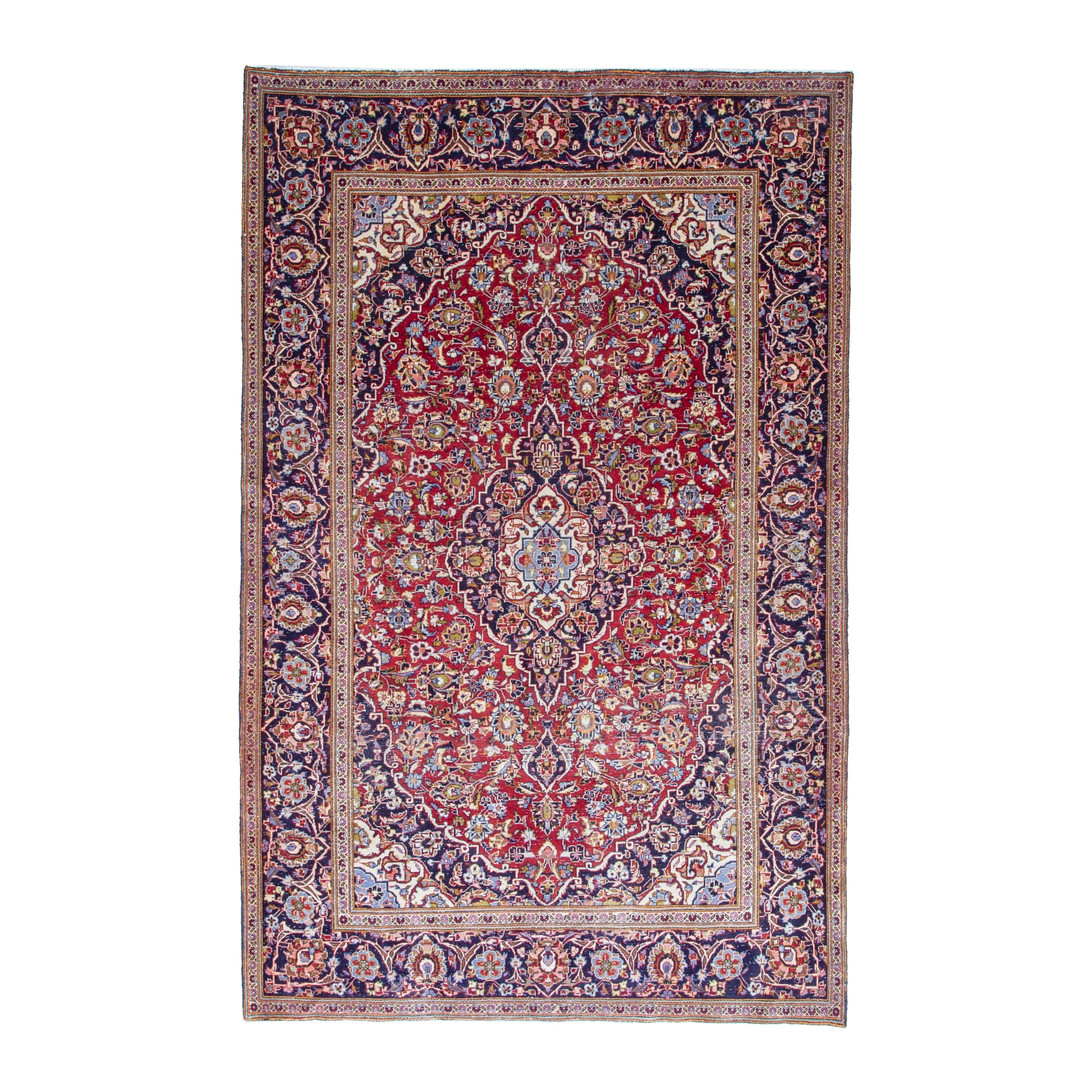 Persian Kashan area rug in deep red and dark blue, 6'5" x 10'1"