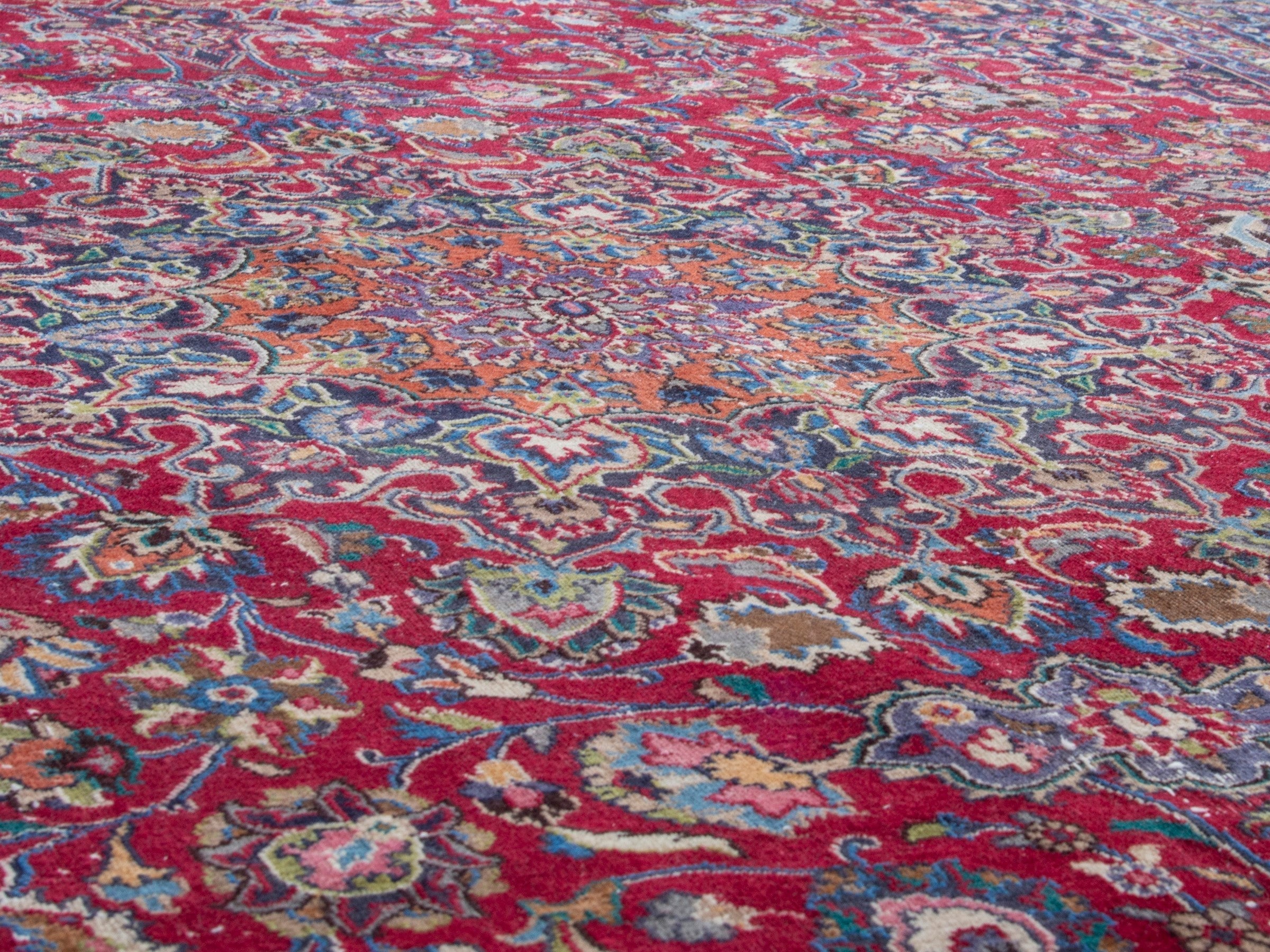 Persian Mashhad oversized rug in deep red and navy, view 8 of 19