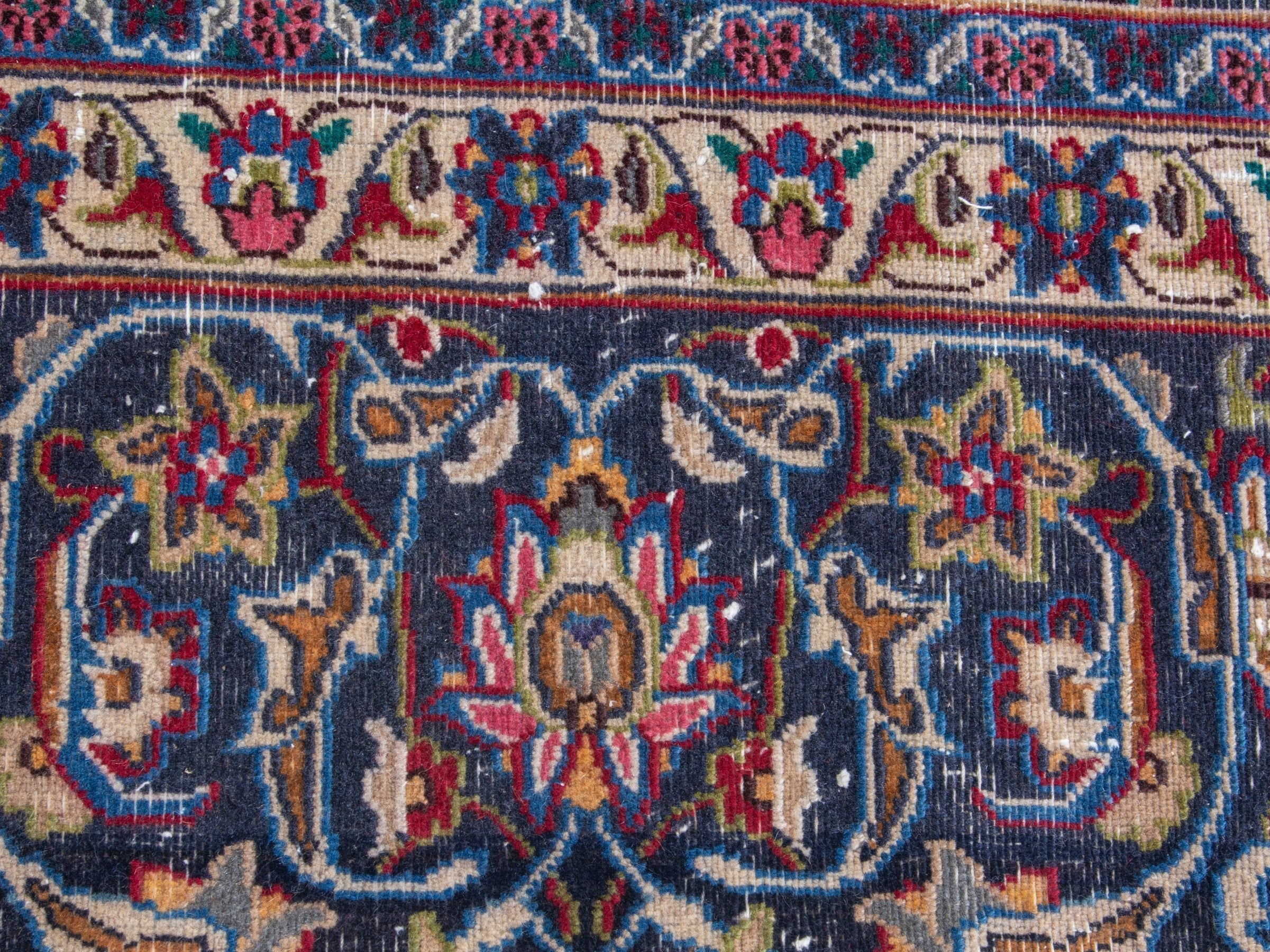 Persian Mashhad oversized rug in deep red and navy, view 11 of 19