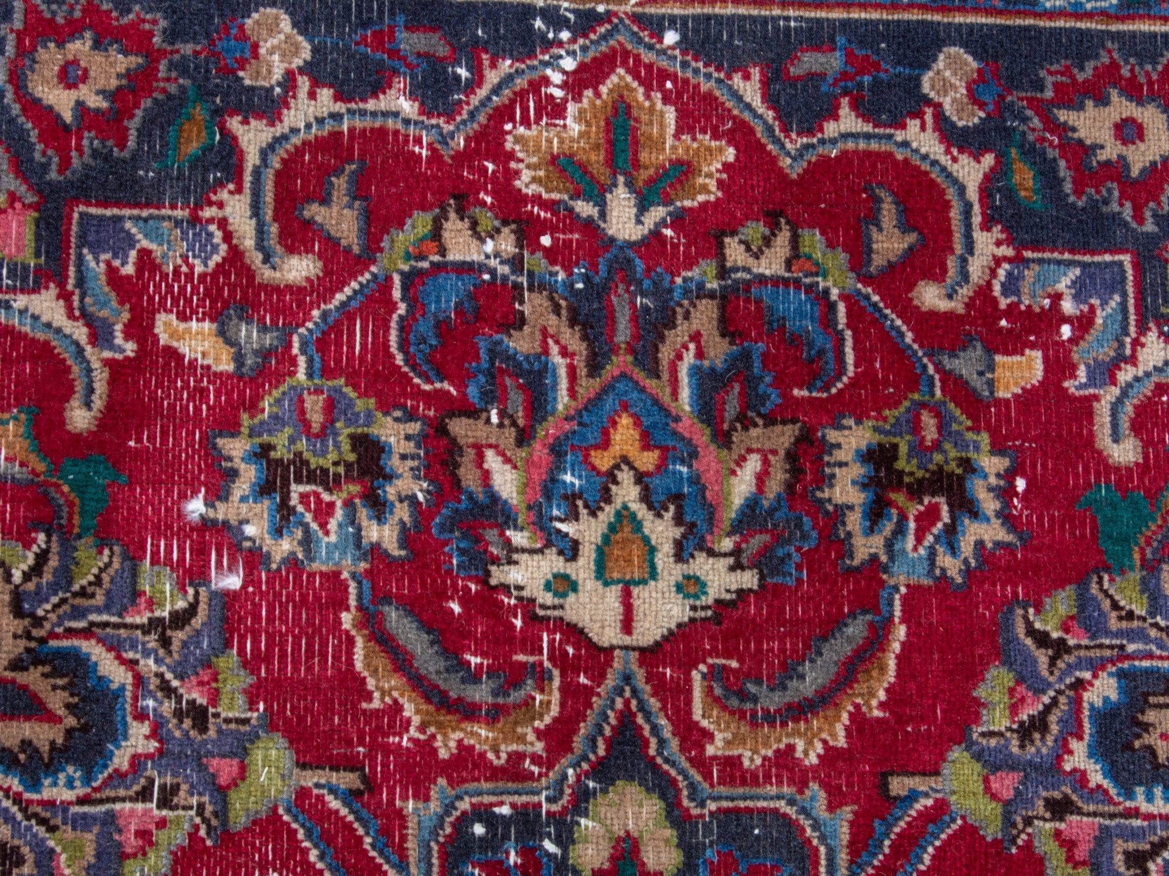 Persian Mashhad oversized rug in deep red and navy, view 12 of 19