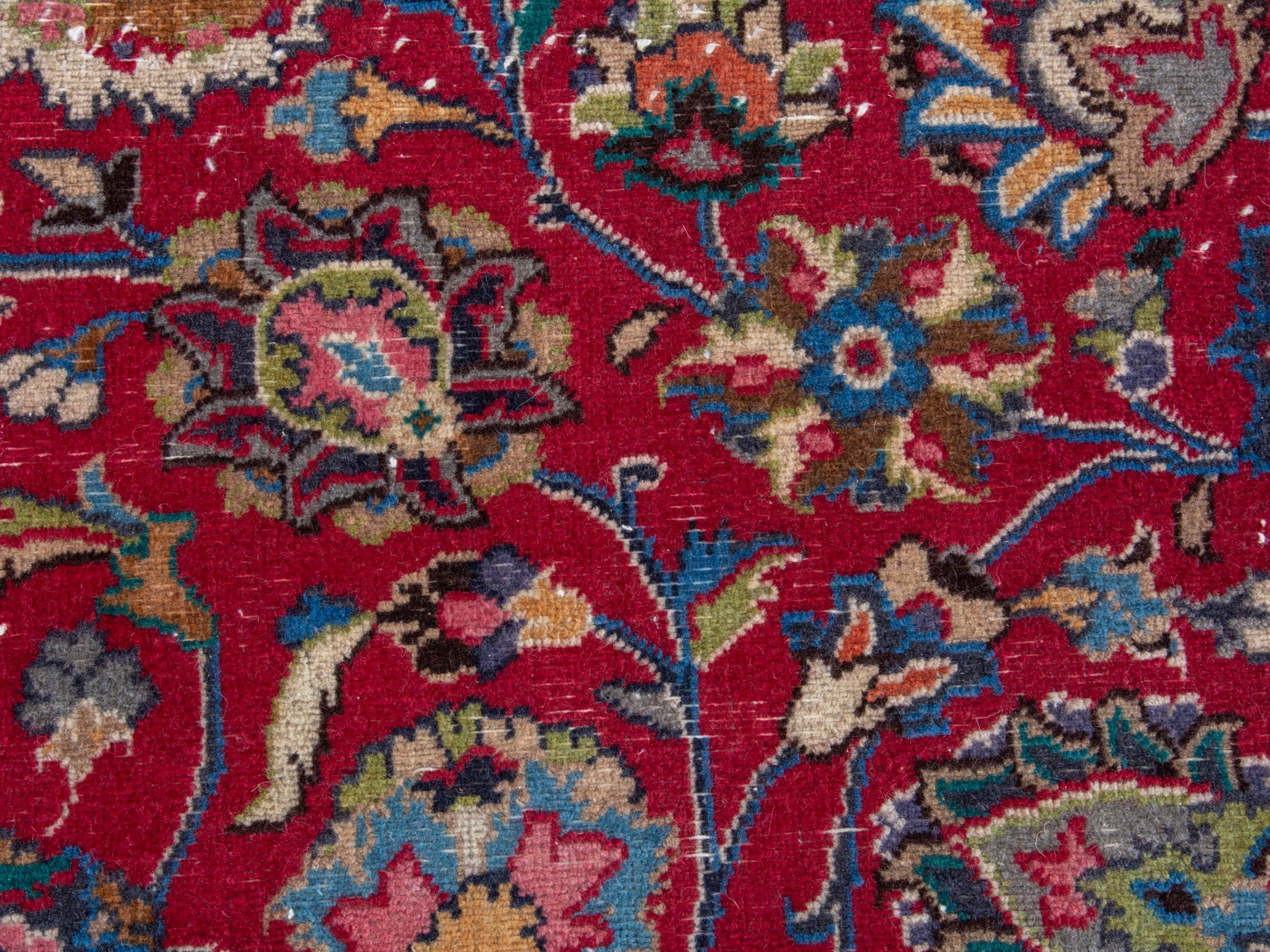 Persian Mashhad oversized rug in deep red and navy, view 13 of 19