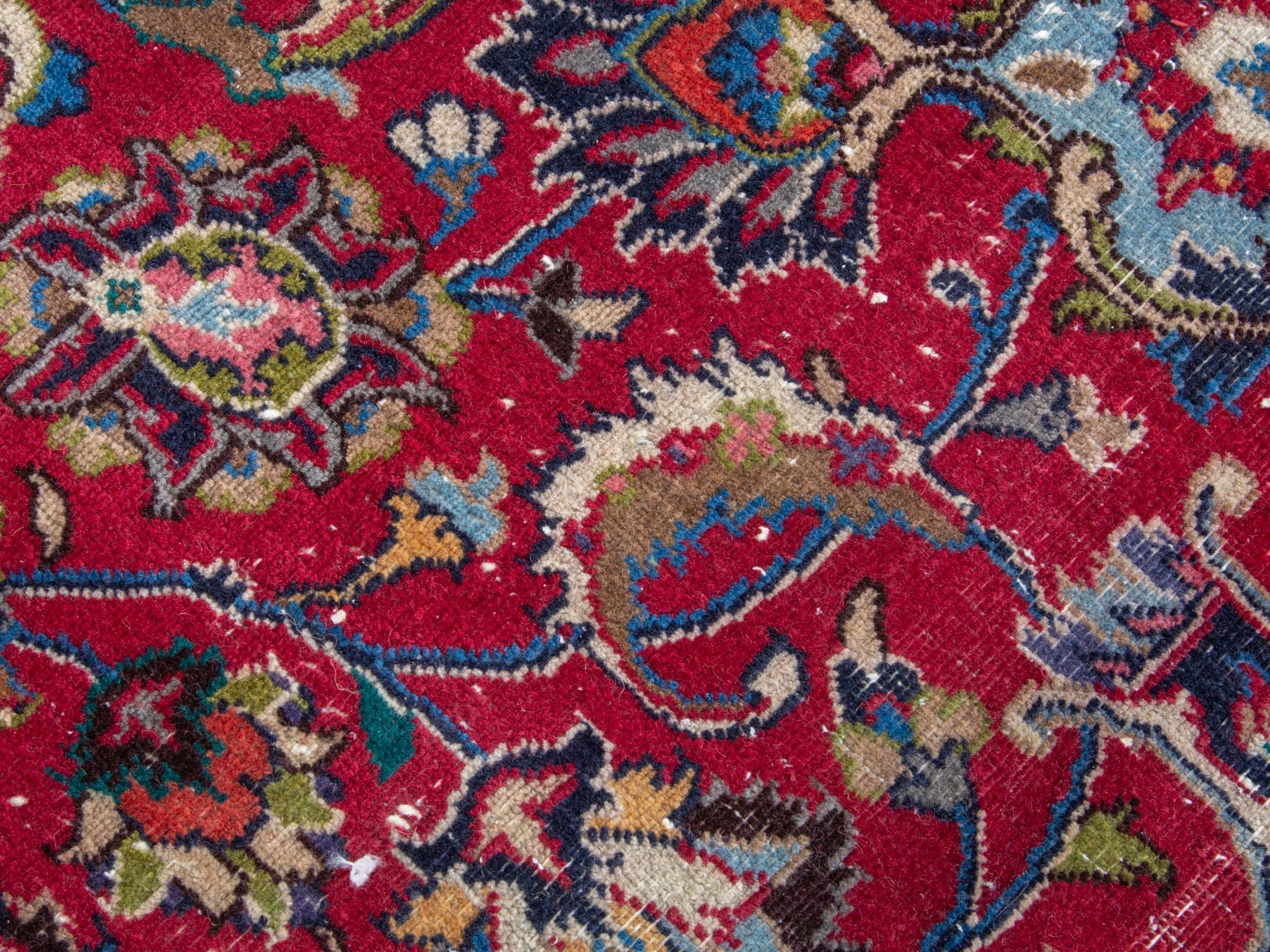 Persian Mashhad oversized rug in deep red and navy, view 14 of 19