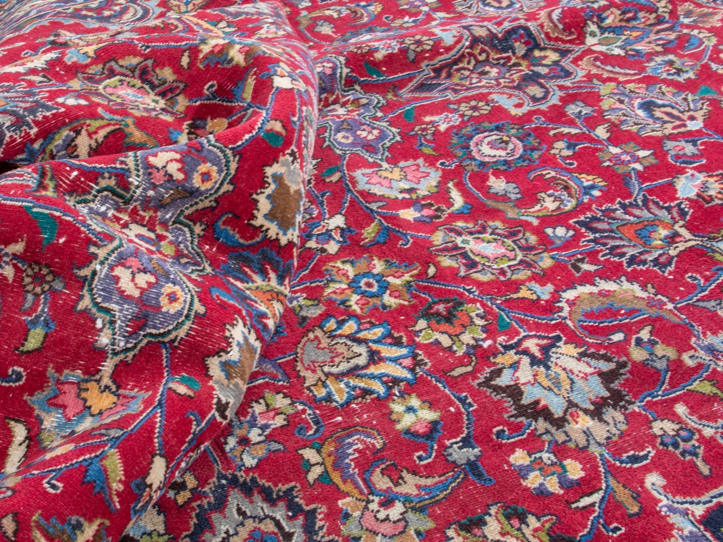 Persian Mashhad oversized rug in deep red and navy, view 17 of 19