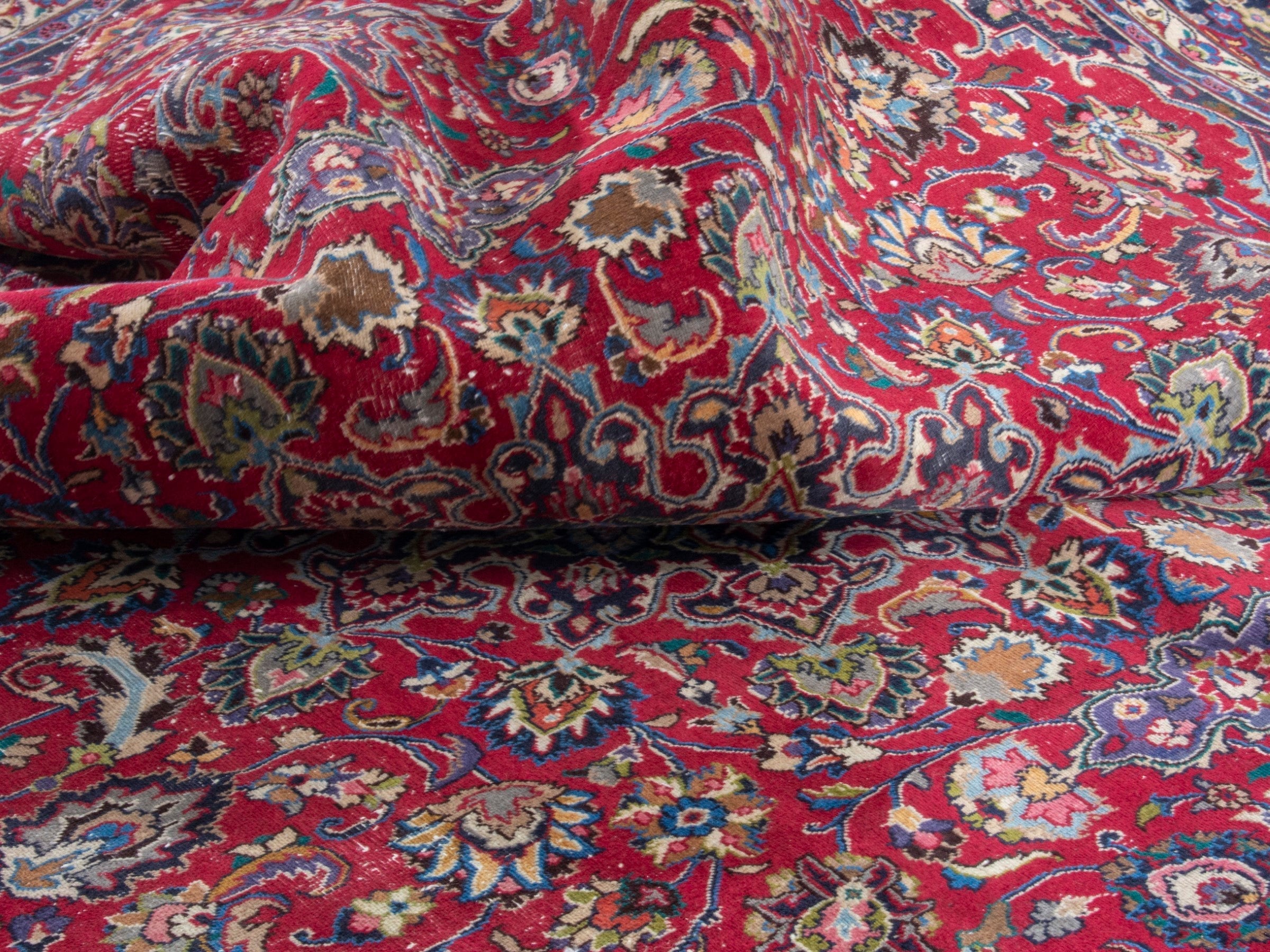 Persian Mashhad oversized rug in deep red and navy, view 18 of 19