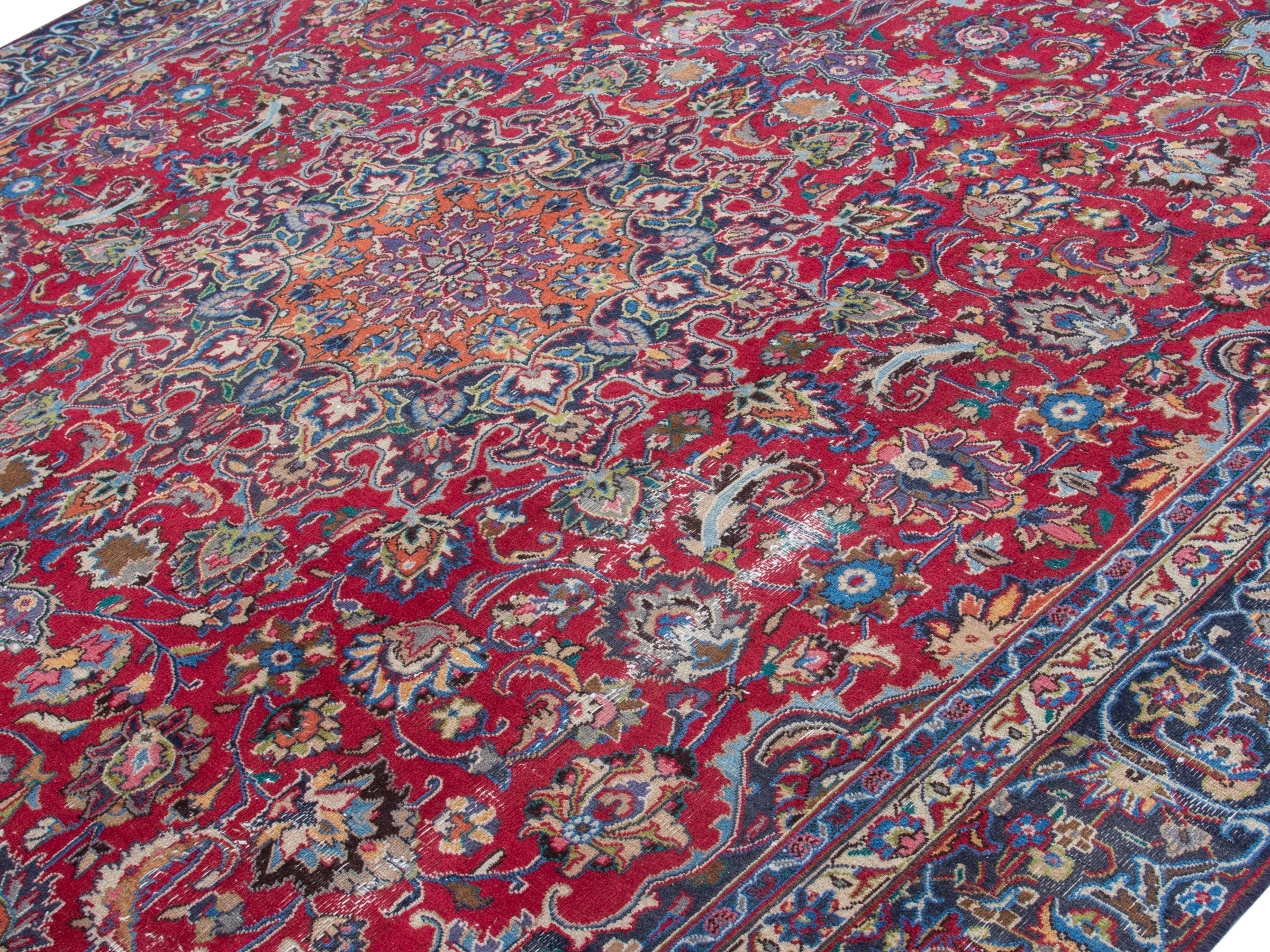 Persian Mashhad oversized rug in deep red and navy, view 4 of 19