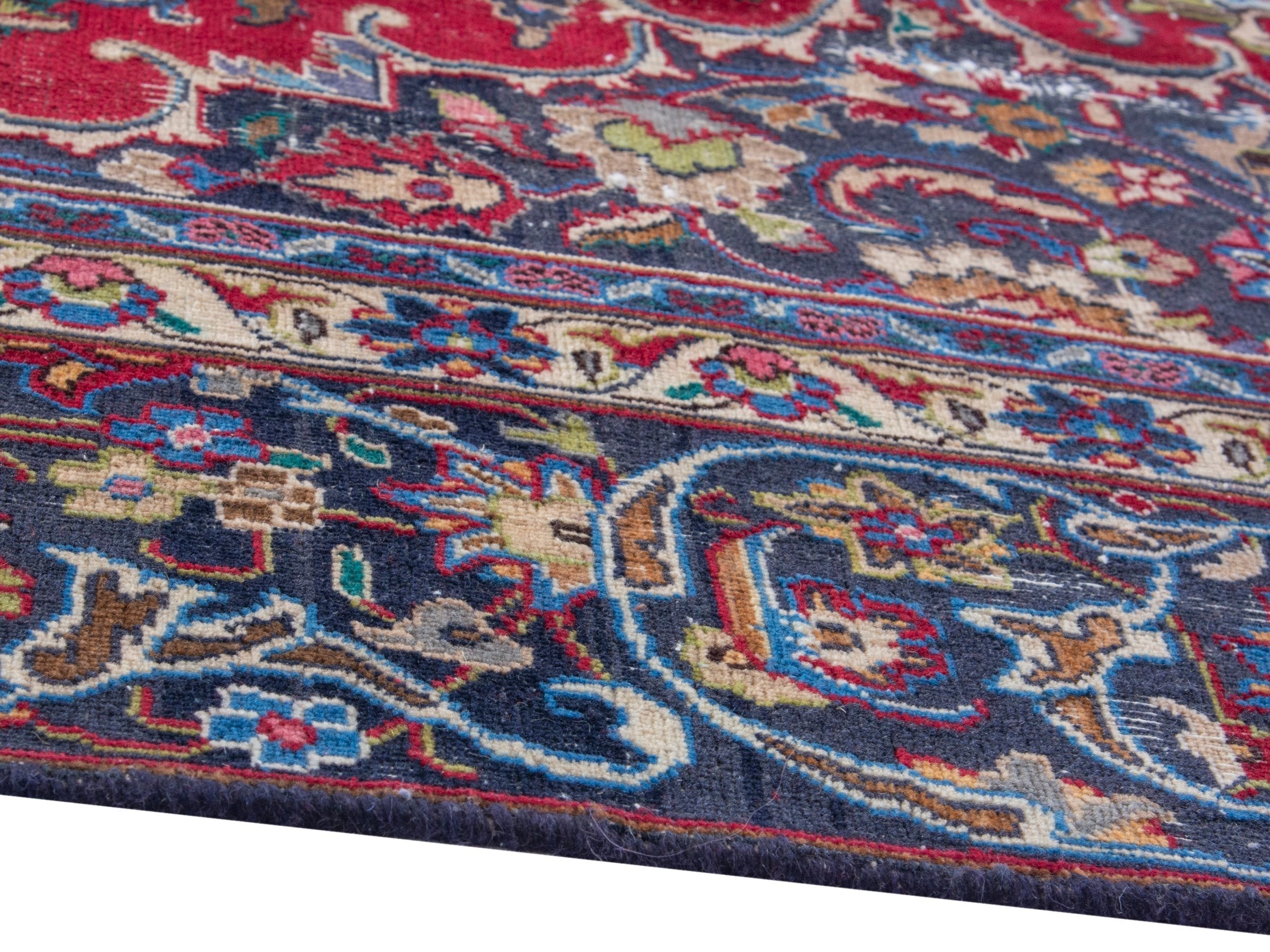 Persian Mashhad oversized rug in deep red and navy, view 6 of 19