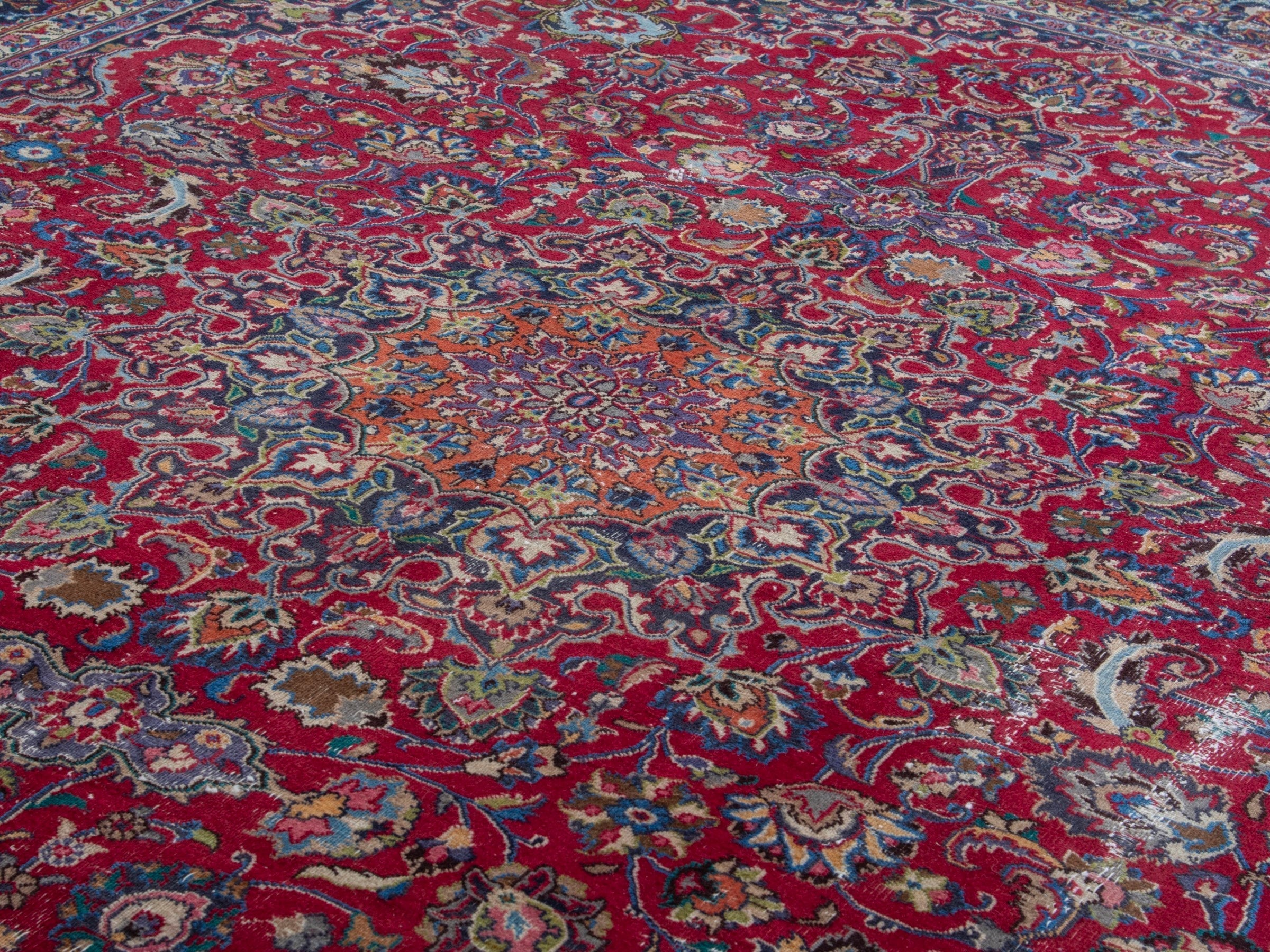 Persian Mashhad oversized rug in deep red and navy, view 7 of 19