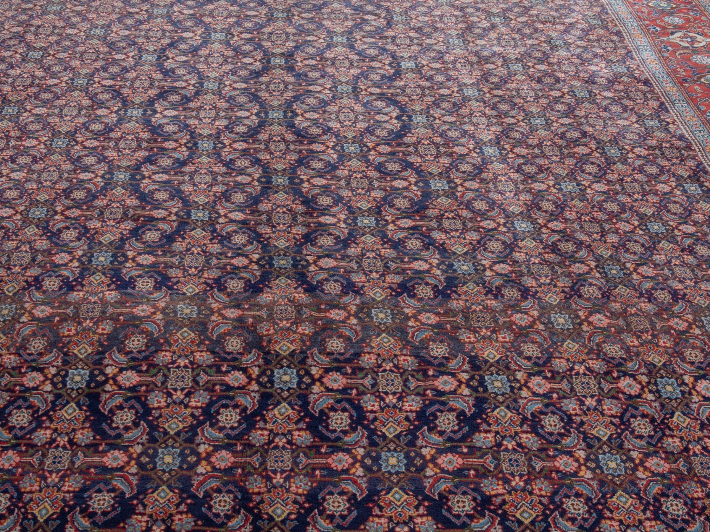 Persian Mahal oversized rug in navy and deep red, view 8 of 28