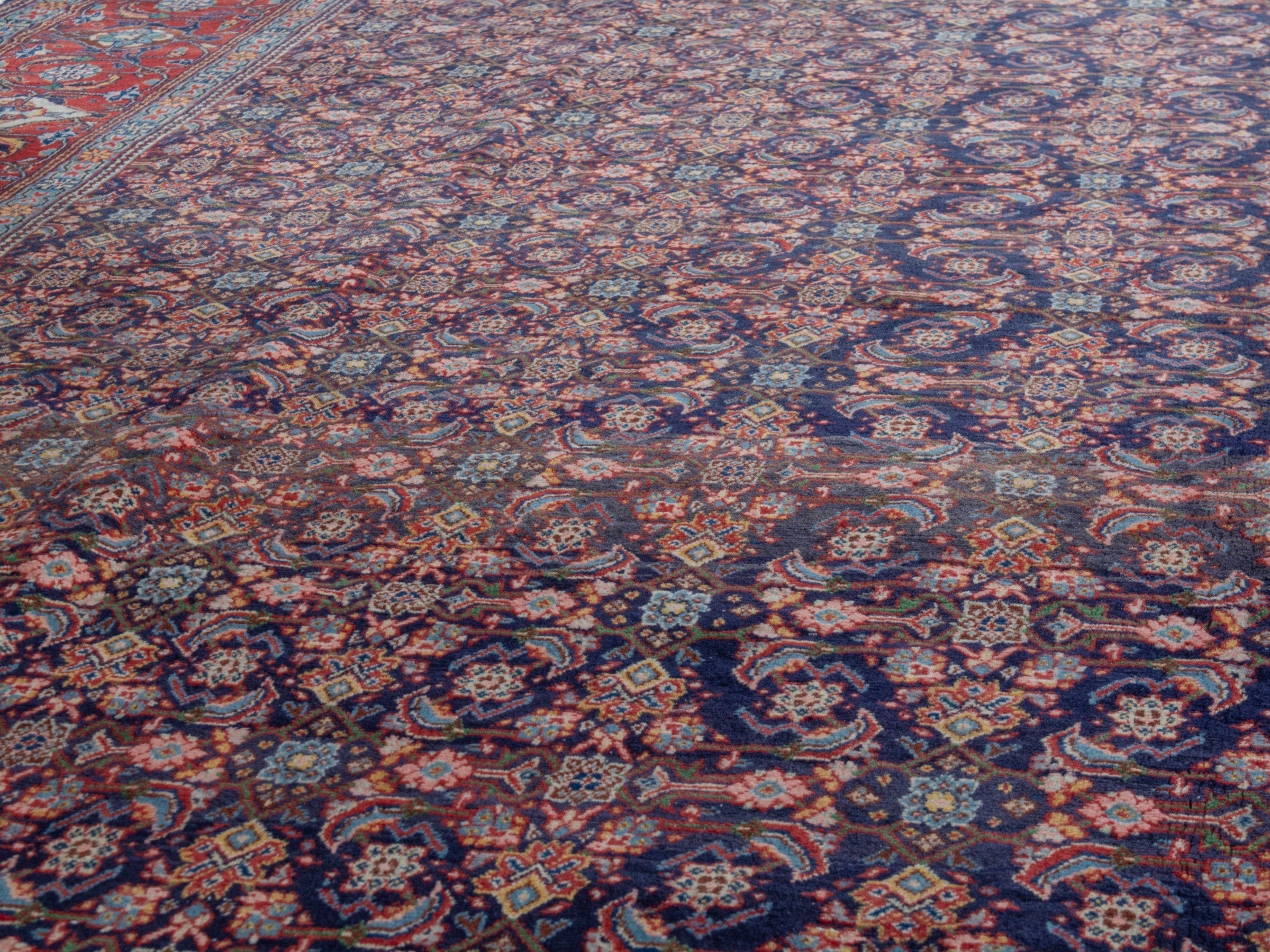 Persian Mahal oversized rug in navy and deep red, view 11 of 28