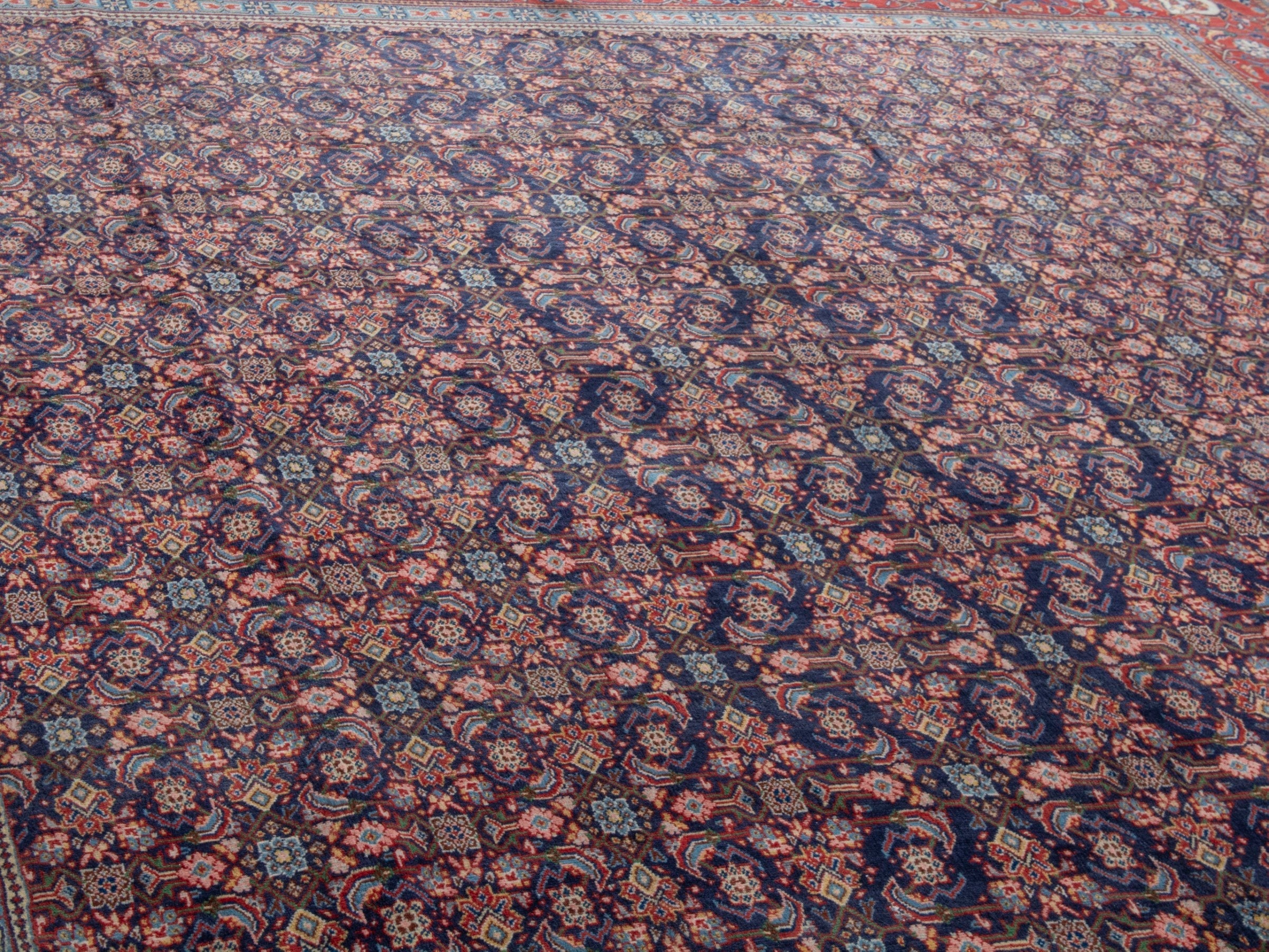 Persian Mahal oversized rug in navy and deep red, view 18 of 28