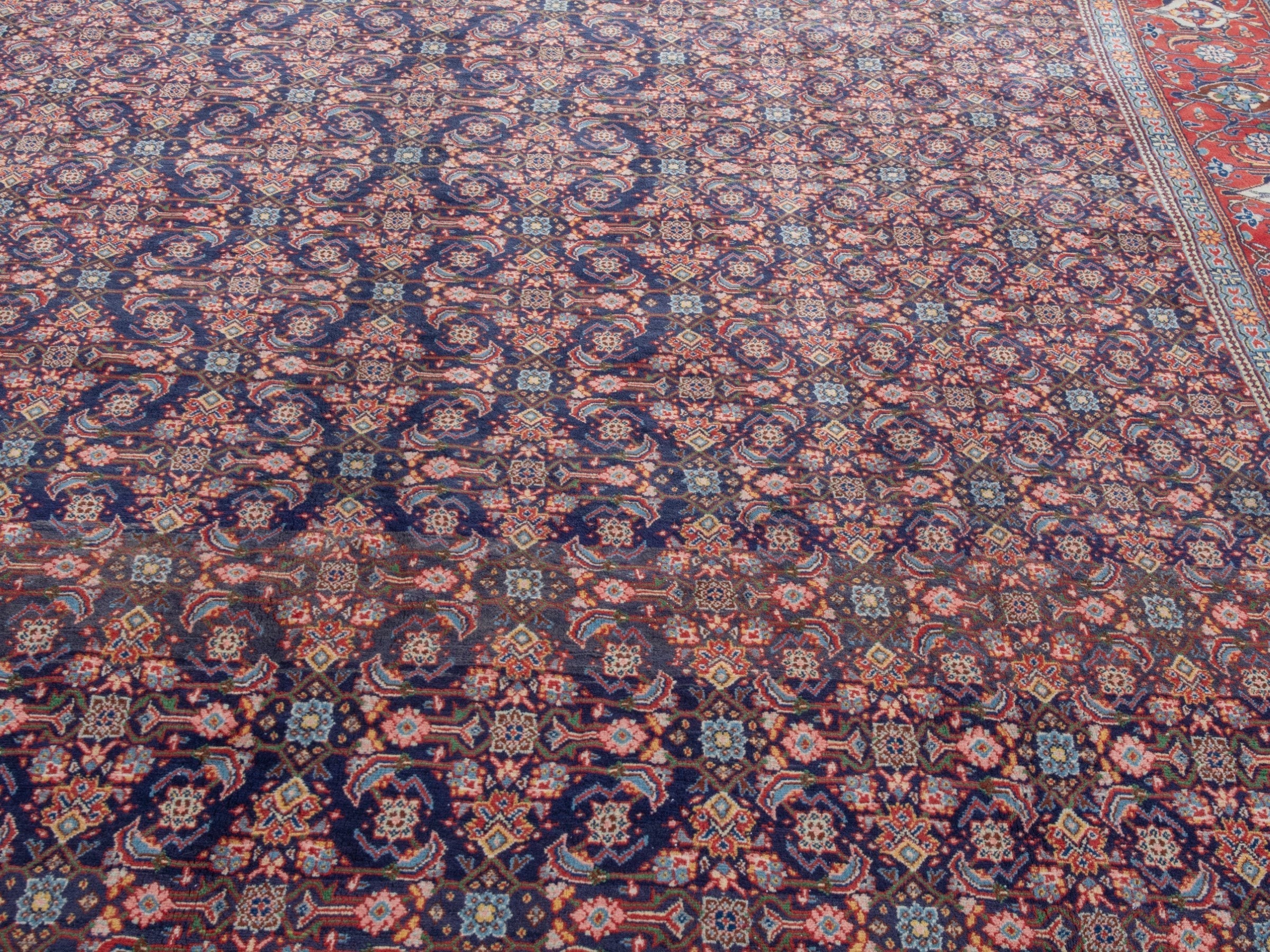 Persian Mahal oversized rug in navy and deep red, view 19 of 28