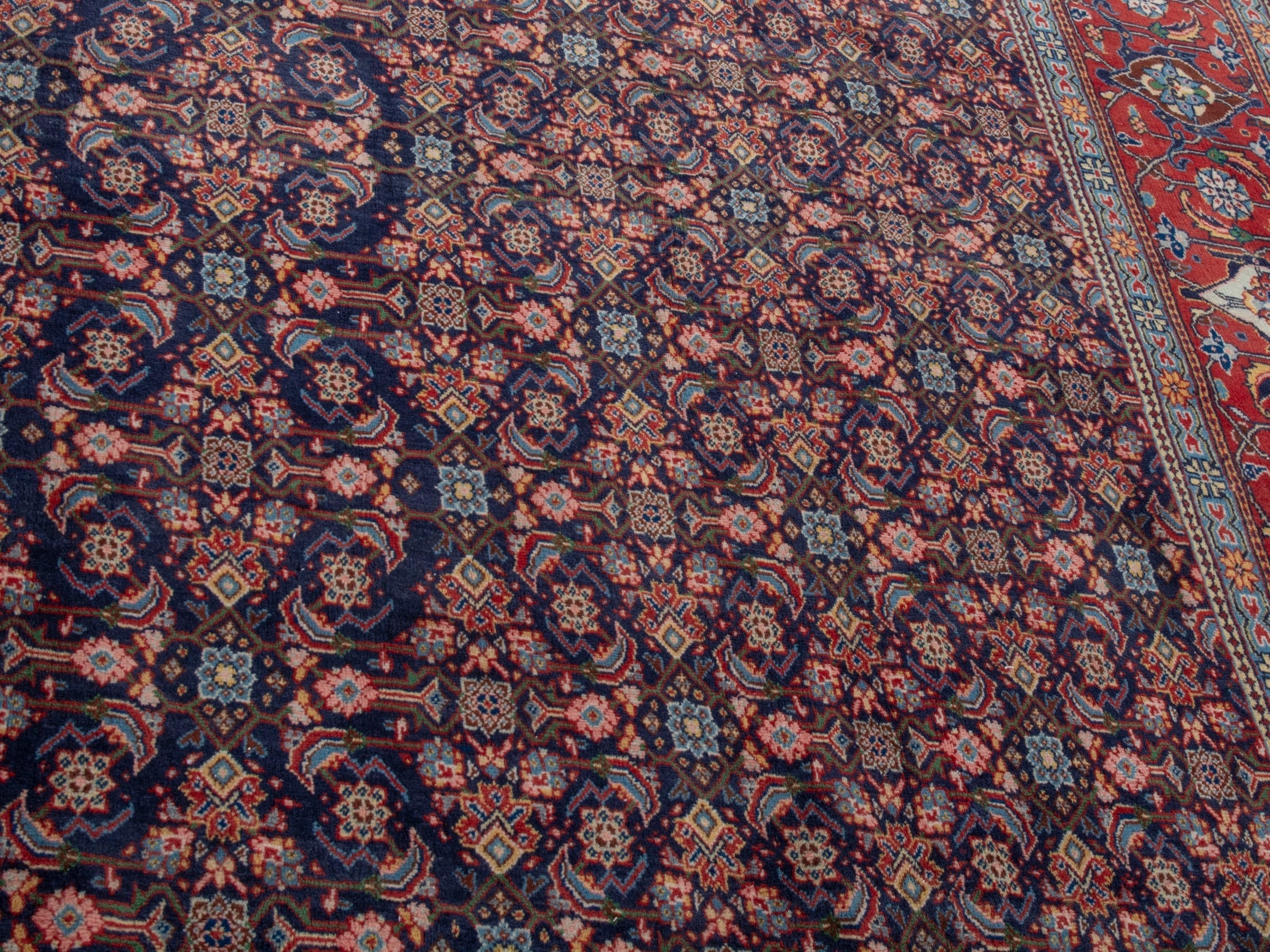 Persian Mahal oversized rug in navy and deep red, view 6 of 28