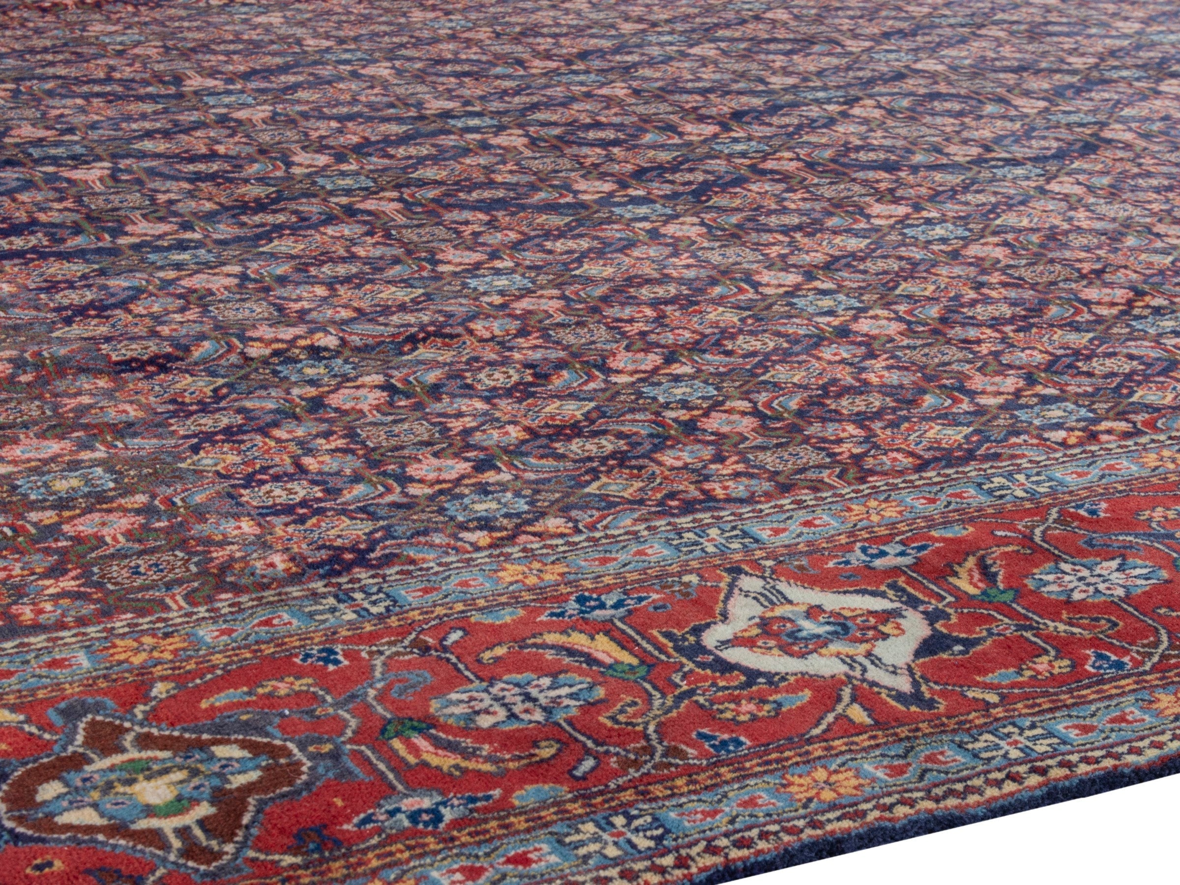 Persian Mahal oversized rug in navy and deep red, view 7 of 28