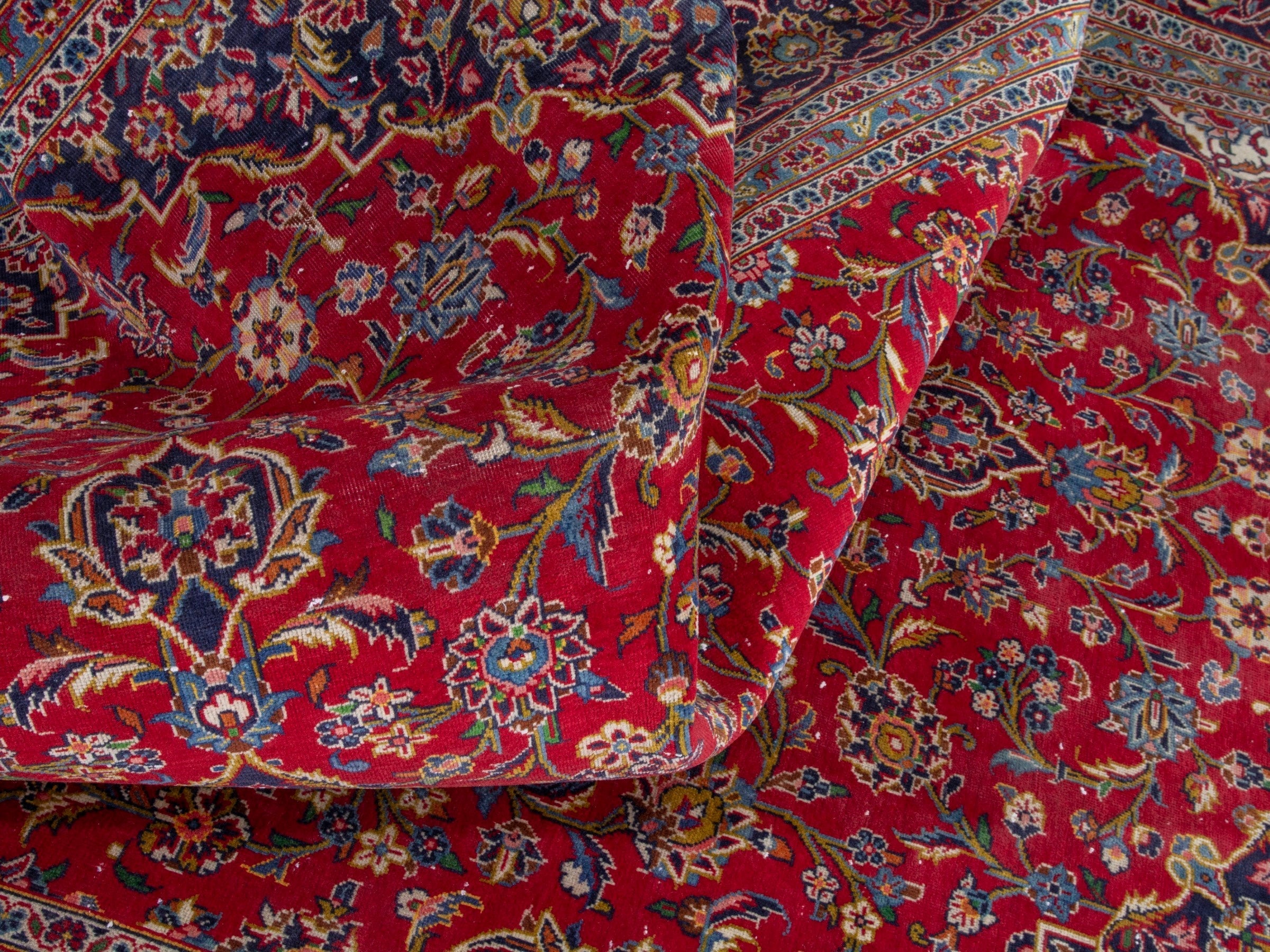 Persian Kashan oversized rug in deep red and navy, view 18 of 23