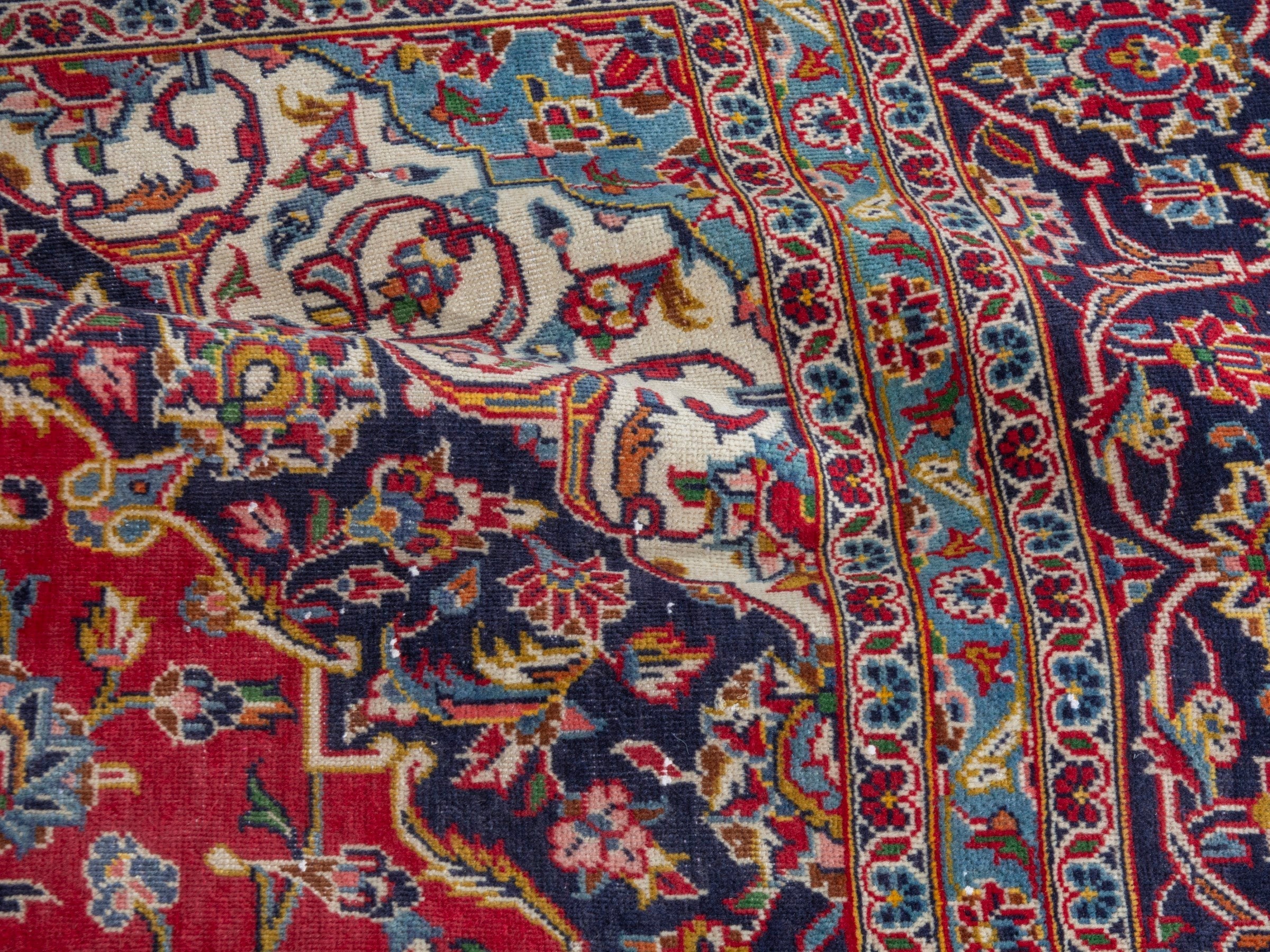 Persian Kashan oversized rug in deep red and navy, view 19 of 23