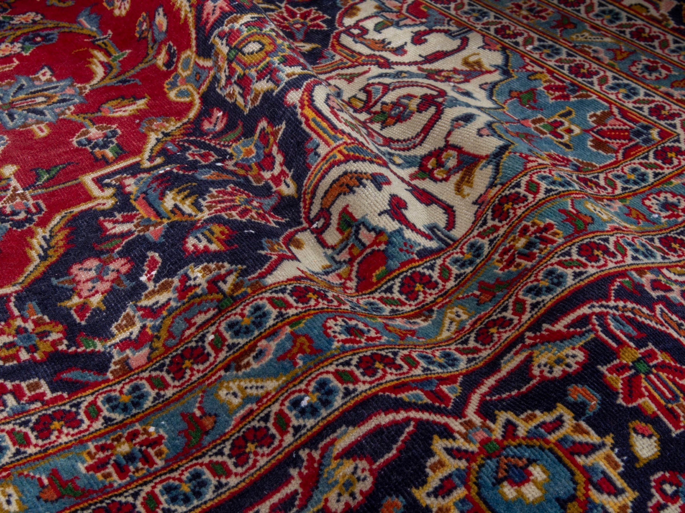 Persian Kashan oversized rug in deep red and navy, view 20 of 23