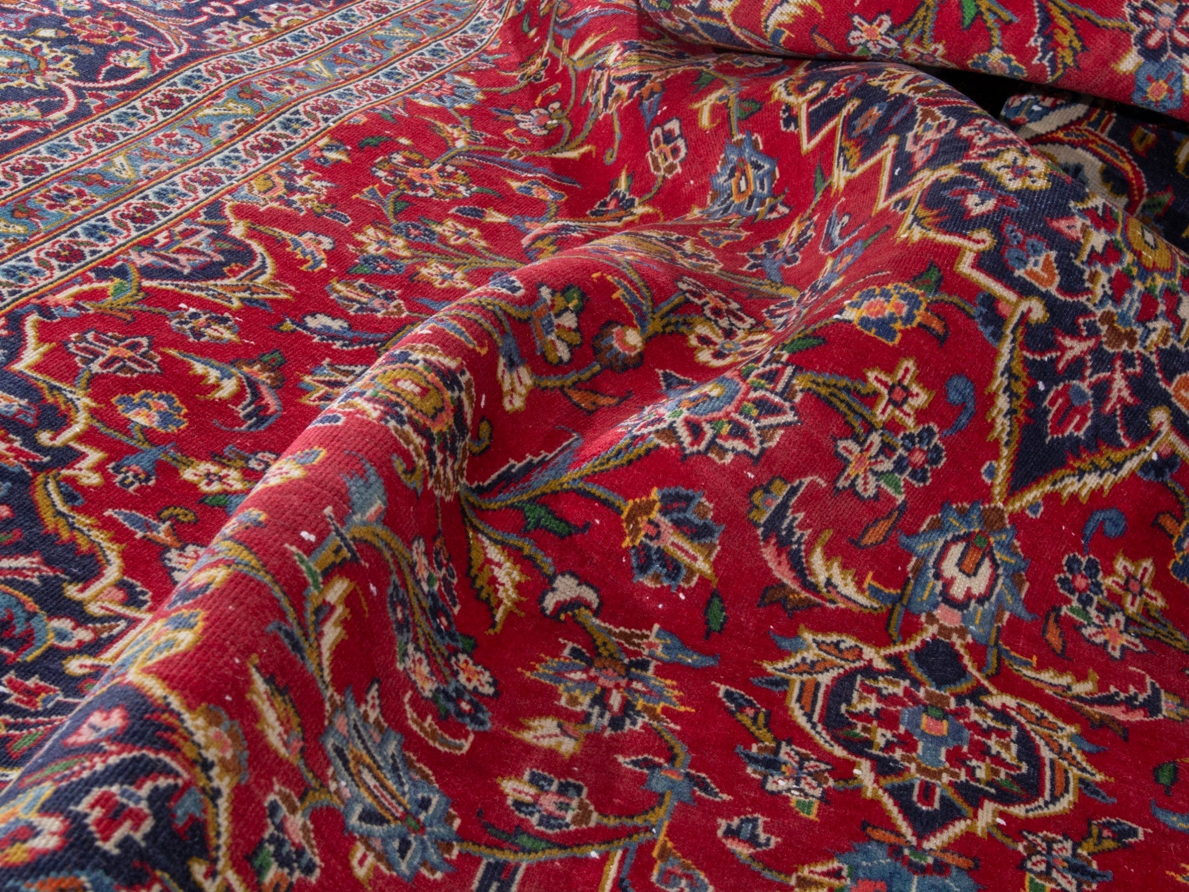 Persian Kashan oversized rug in deep red and navy, view 21 of 23