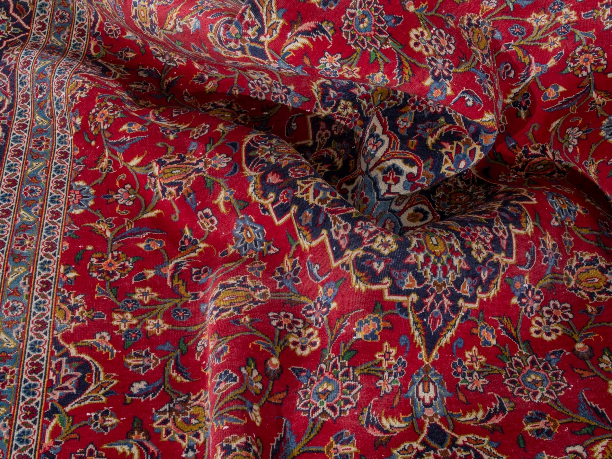 Persian Kashan oversized rug in deep red and navy, view 22 of 23