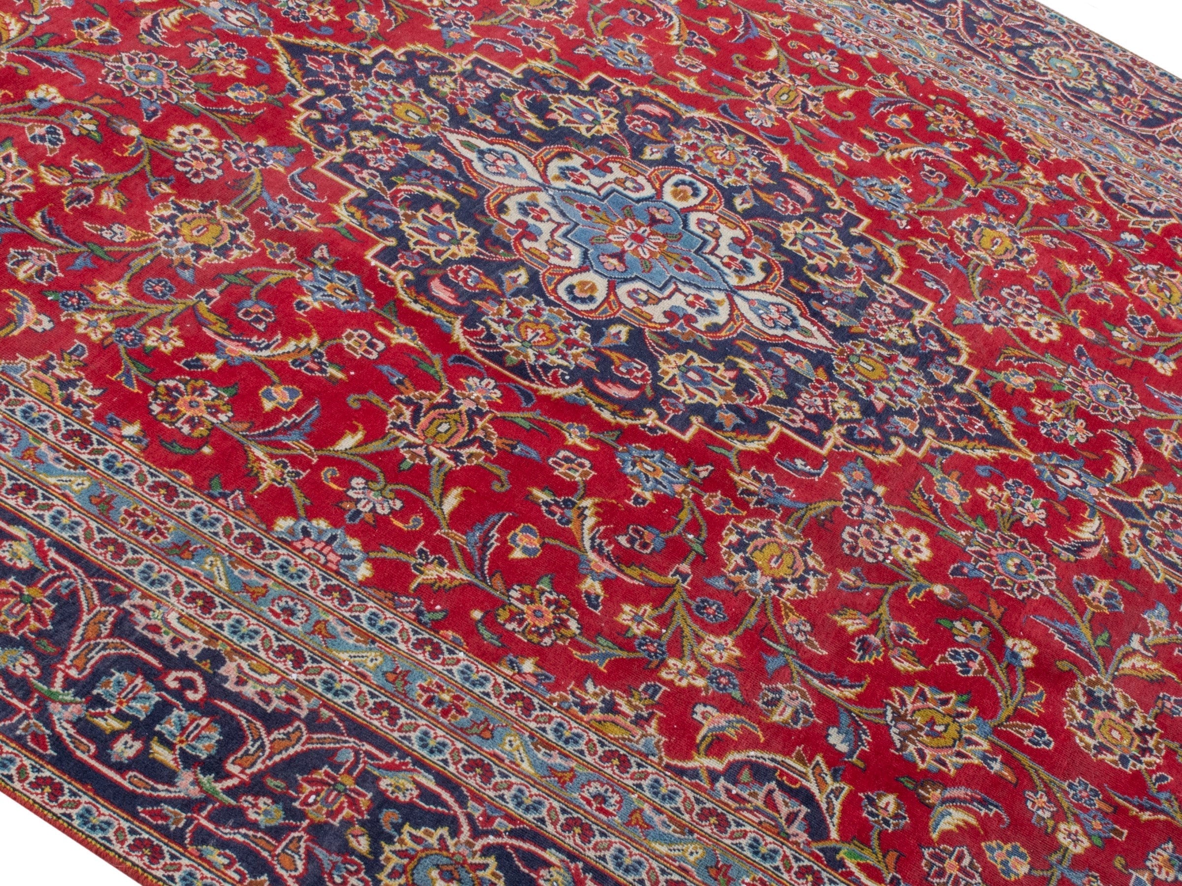 Persian Kashan oversized rug in deep red and navy, view 4 of 23