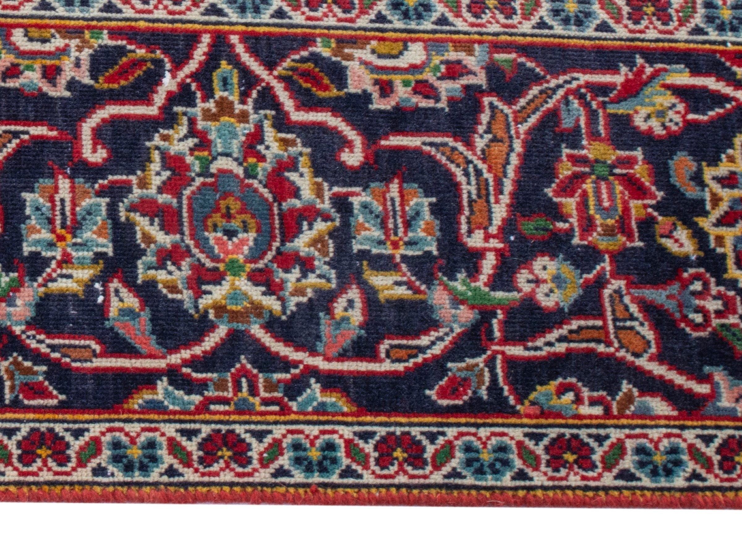 Persian Kashan oversized rug in deep red and navy, view 10 of 23