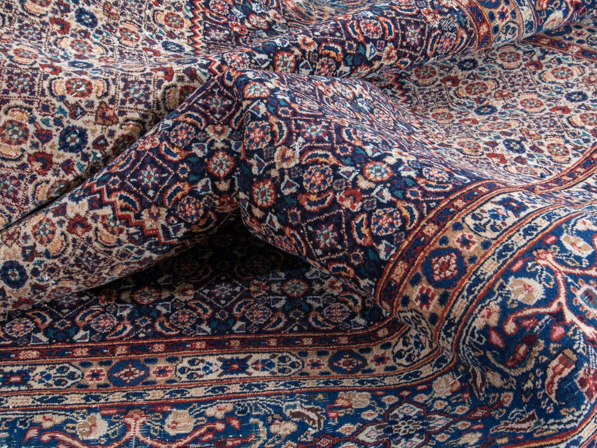 Persian Birjand oversized rug in rust and navy, view 17 of 22