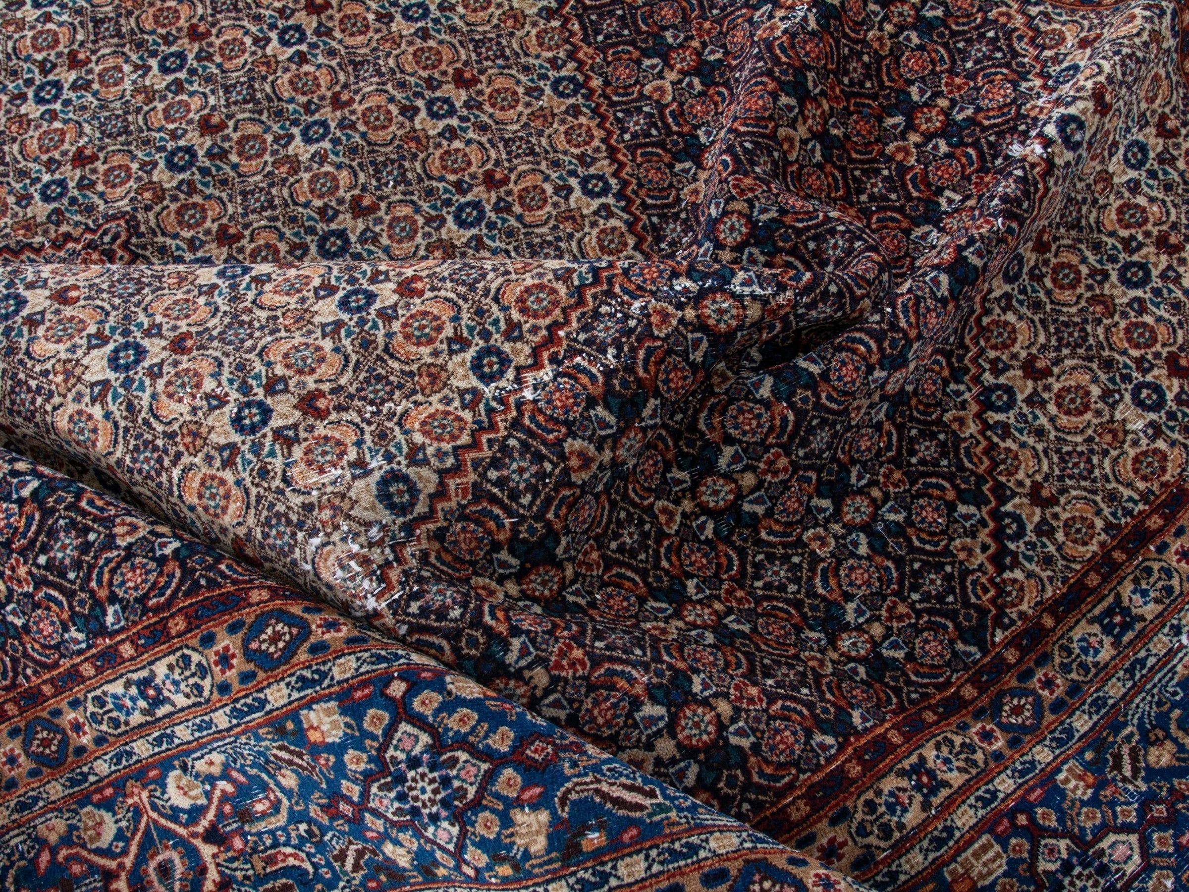 Persian Birjand oversized rug in rust and navy, view 19 of 22