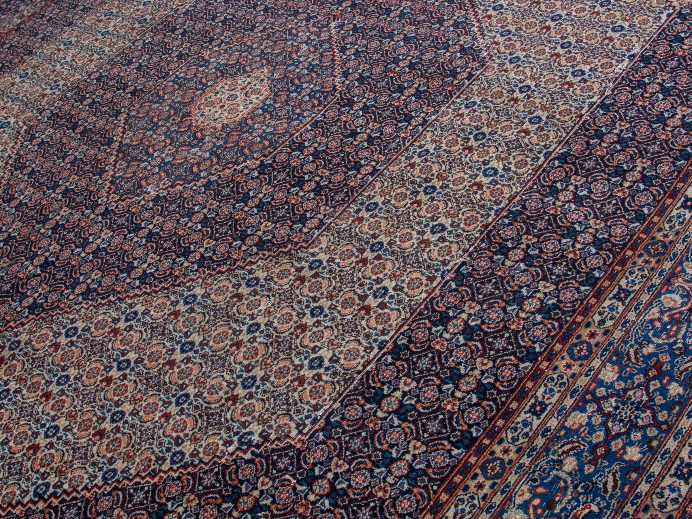 Persian Birjand oversized rug in rust and navy, view 4 of 22