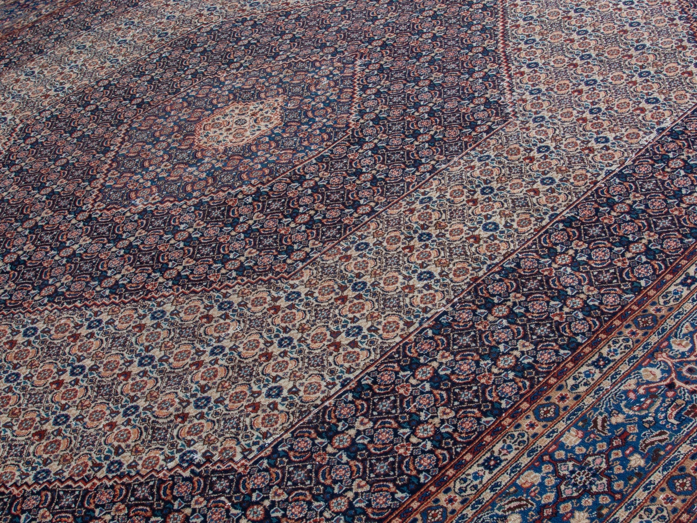 Persian Birjand oversized rug in rust and navy, view 10 of 22