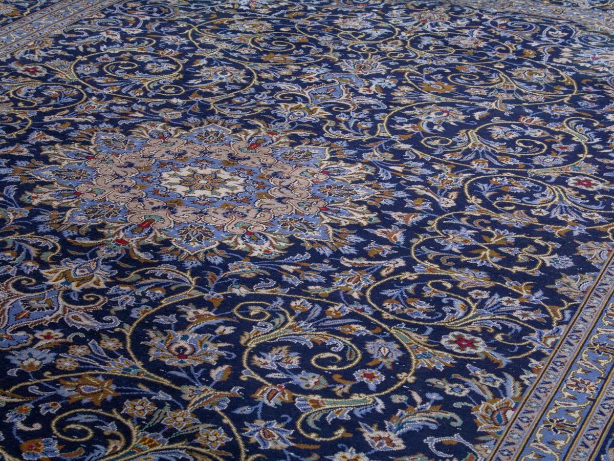 Persian Kashan oversized rug in navy and cream, view 11 of 22