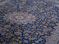 Persian Kashan oversized rug in navy and cream, view 11 of 22